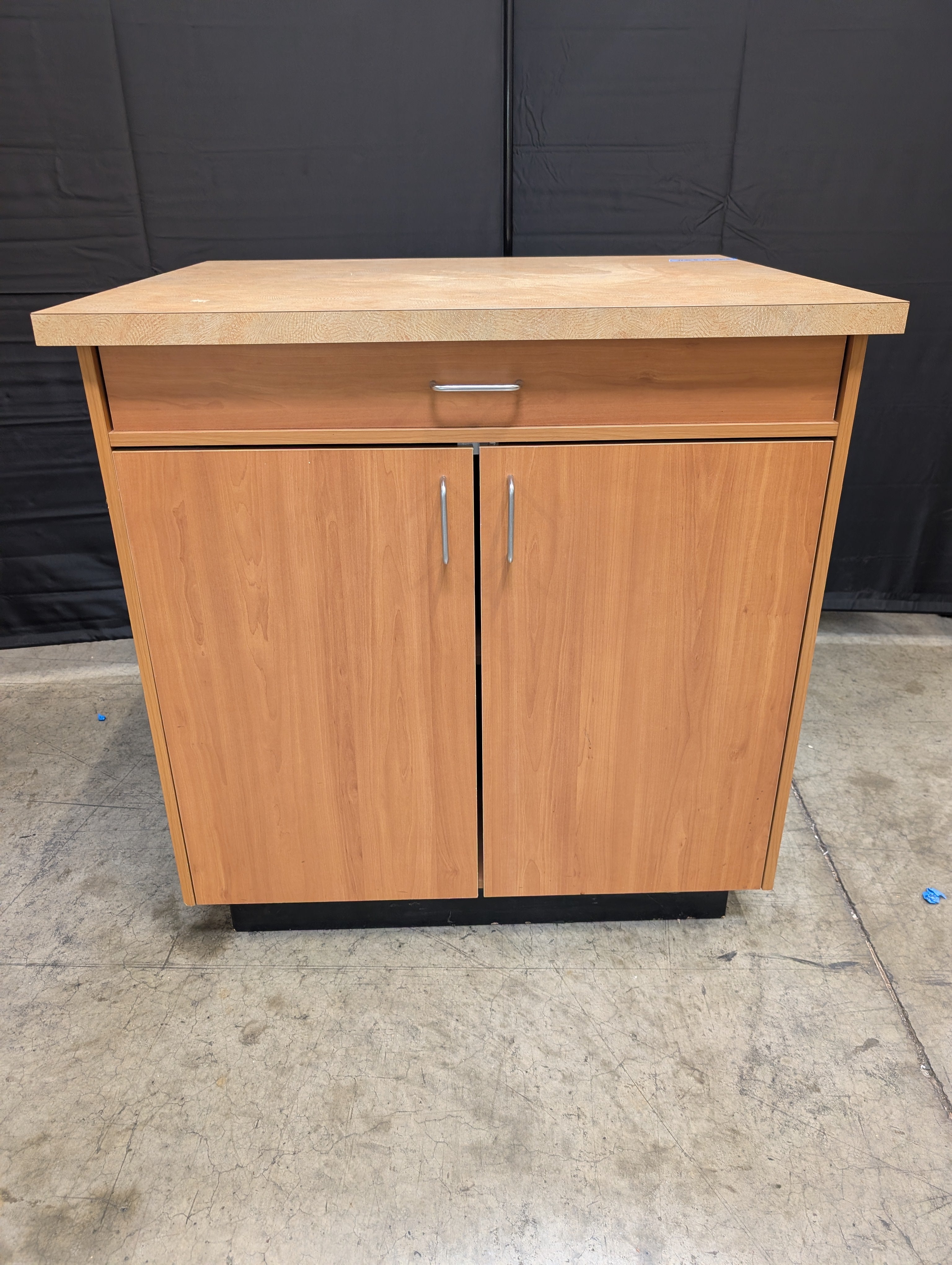 Two-Door Base Cabinet with Speckled Laminate Countertop