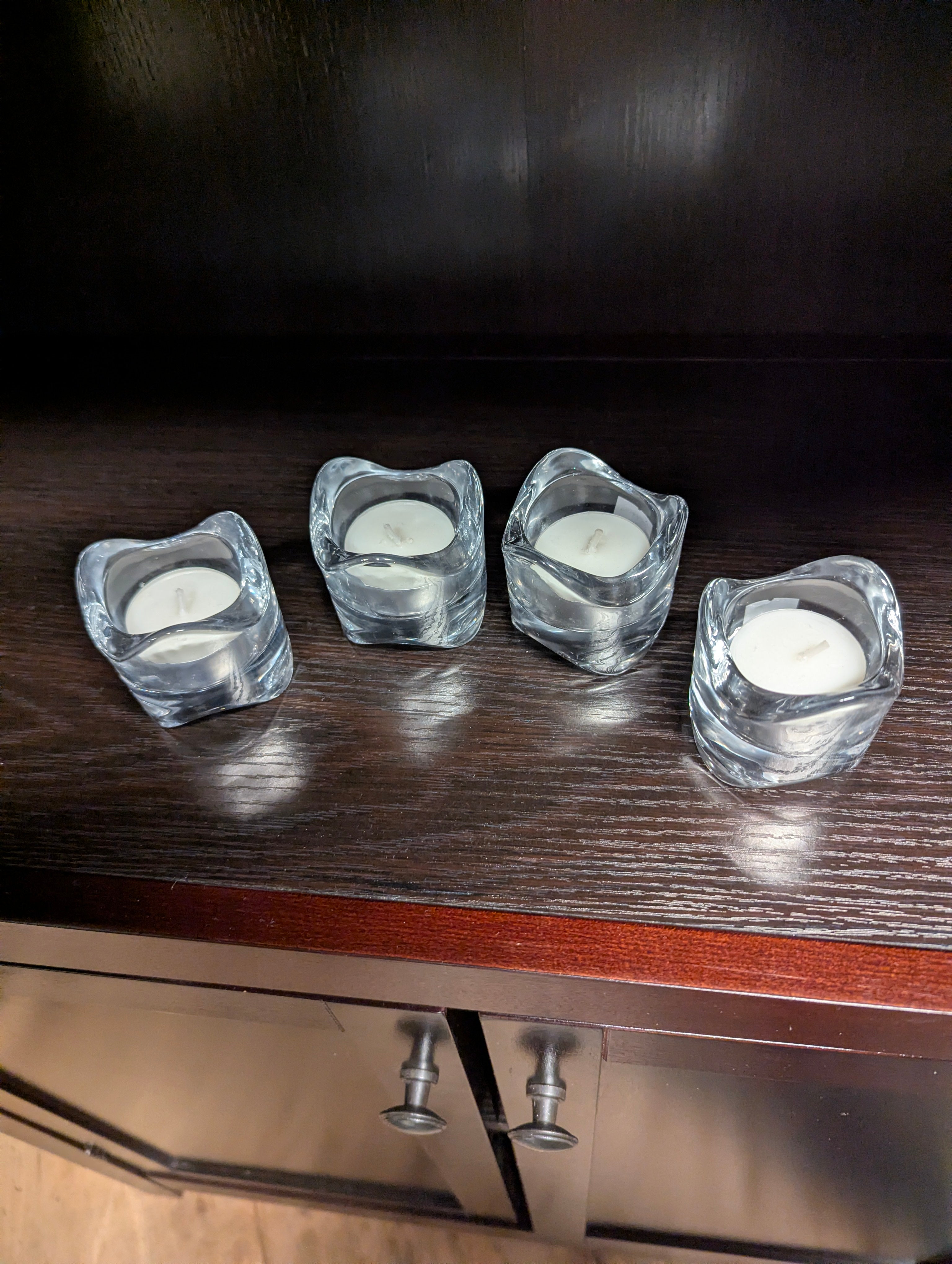 Set of Four Clear Glass Votive Candle Holders with Wavy Design