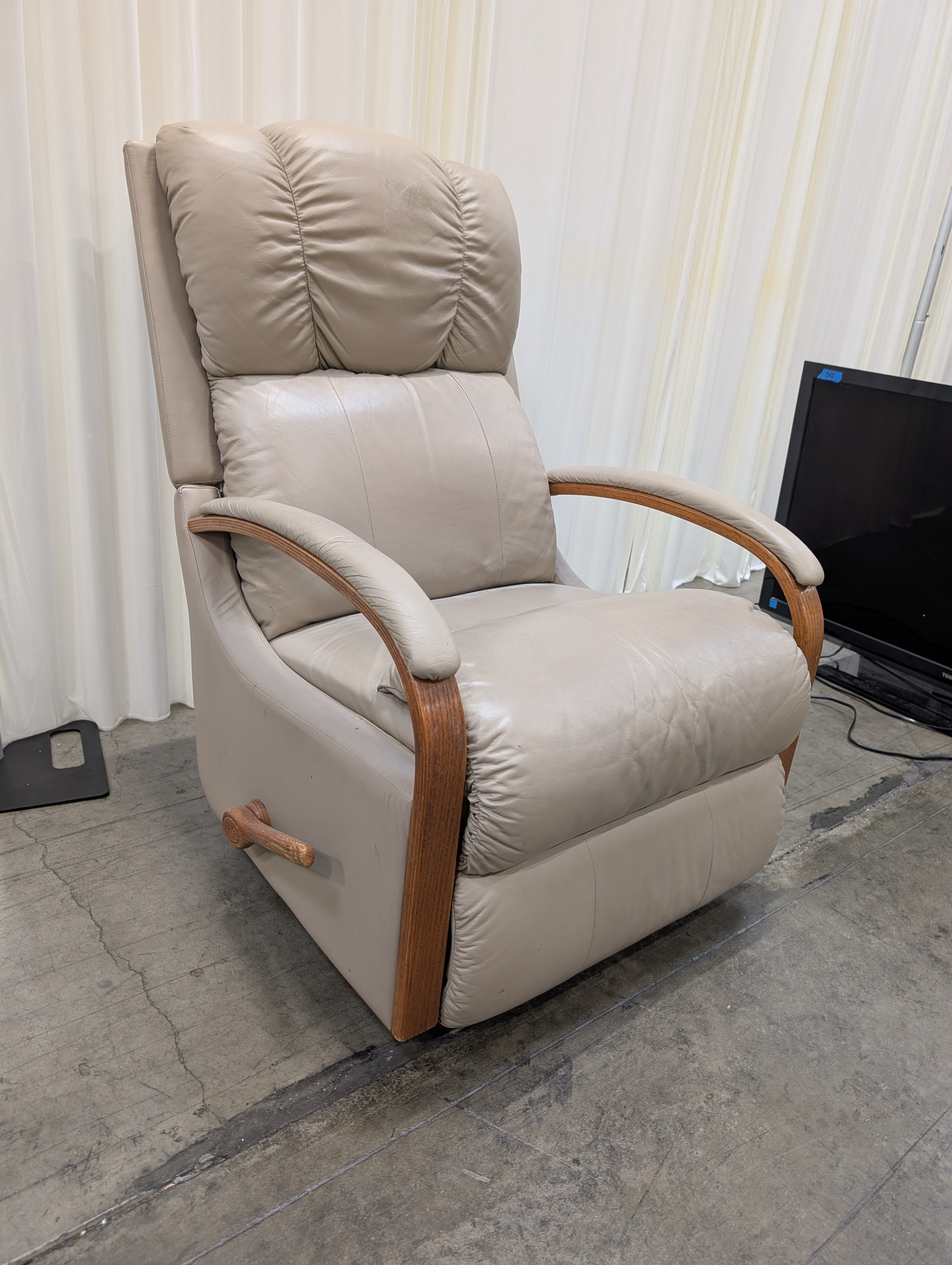 Grey Leatherette Recliner with Wood Trim
