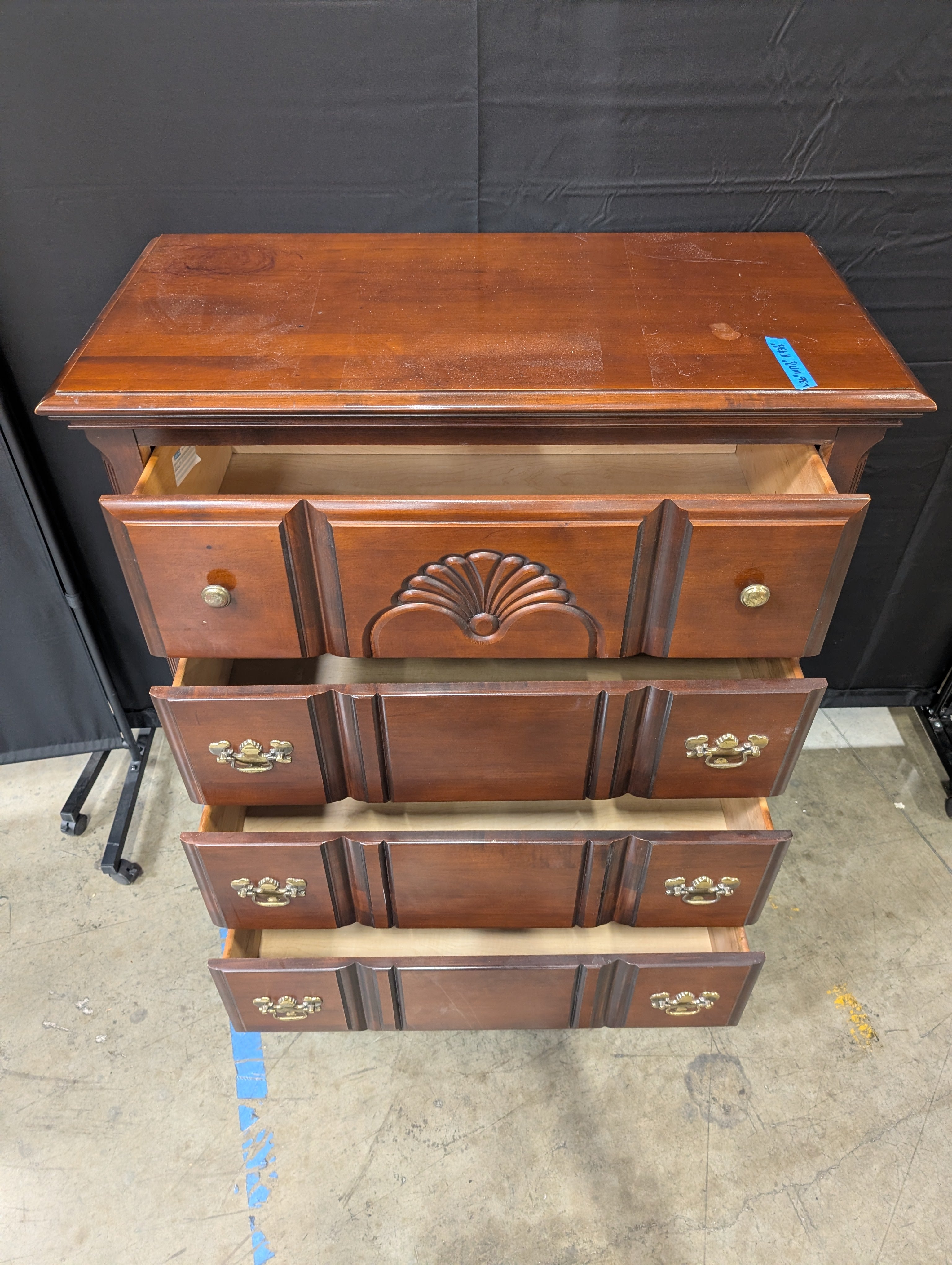 Traditional Dark Wood Dresser with Ornate Hardware