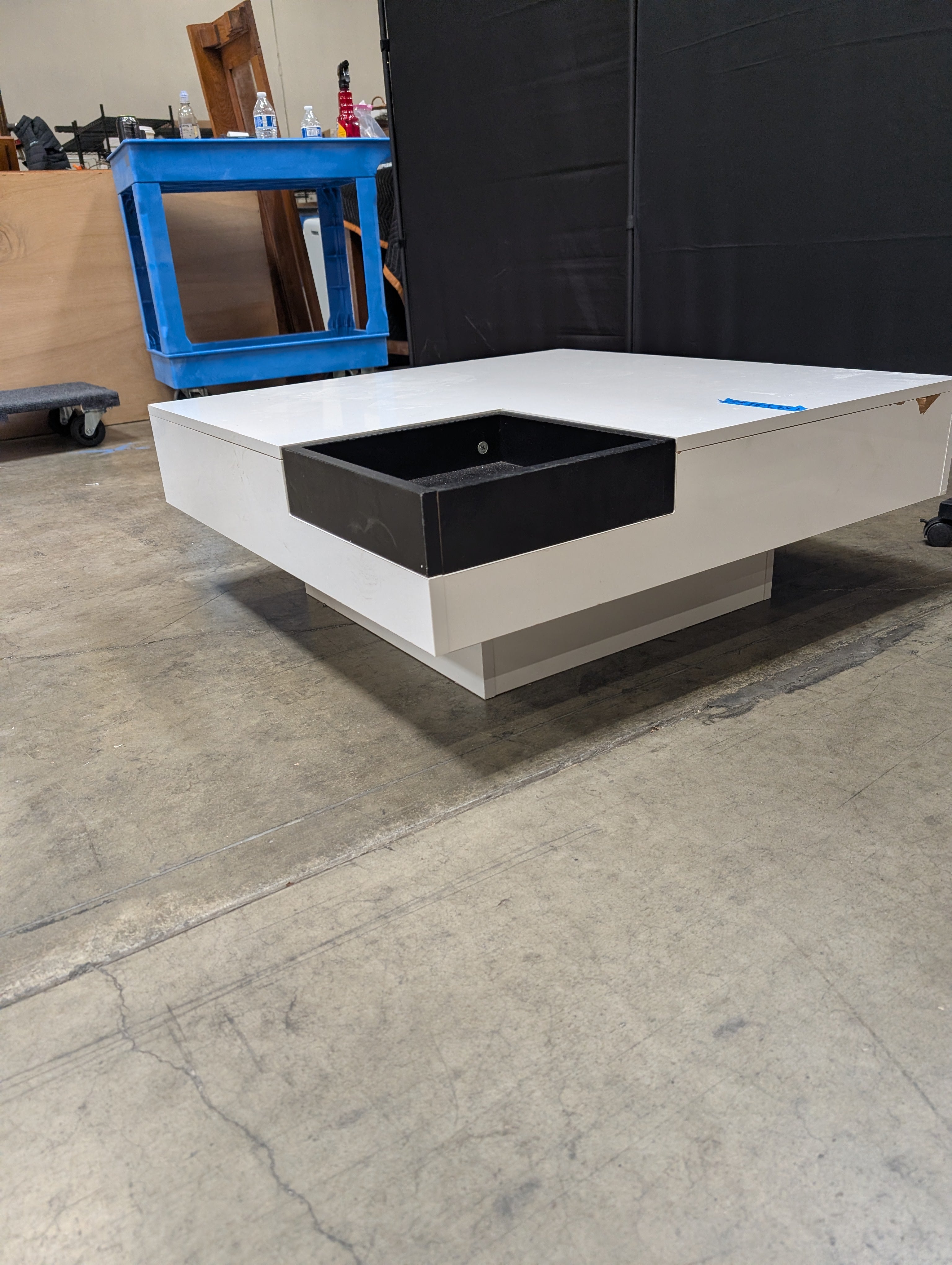 Contemporary High-Gloss White Coffee Table with Black Recessed Compartment