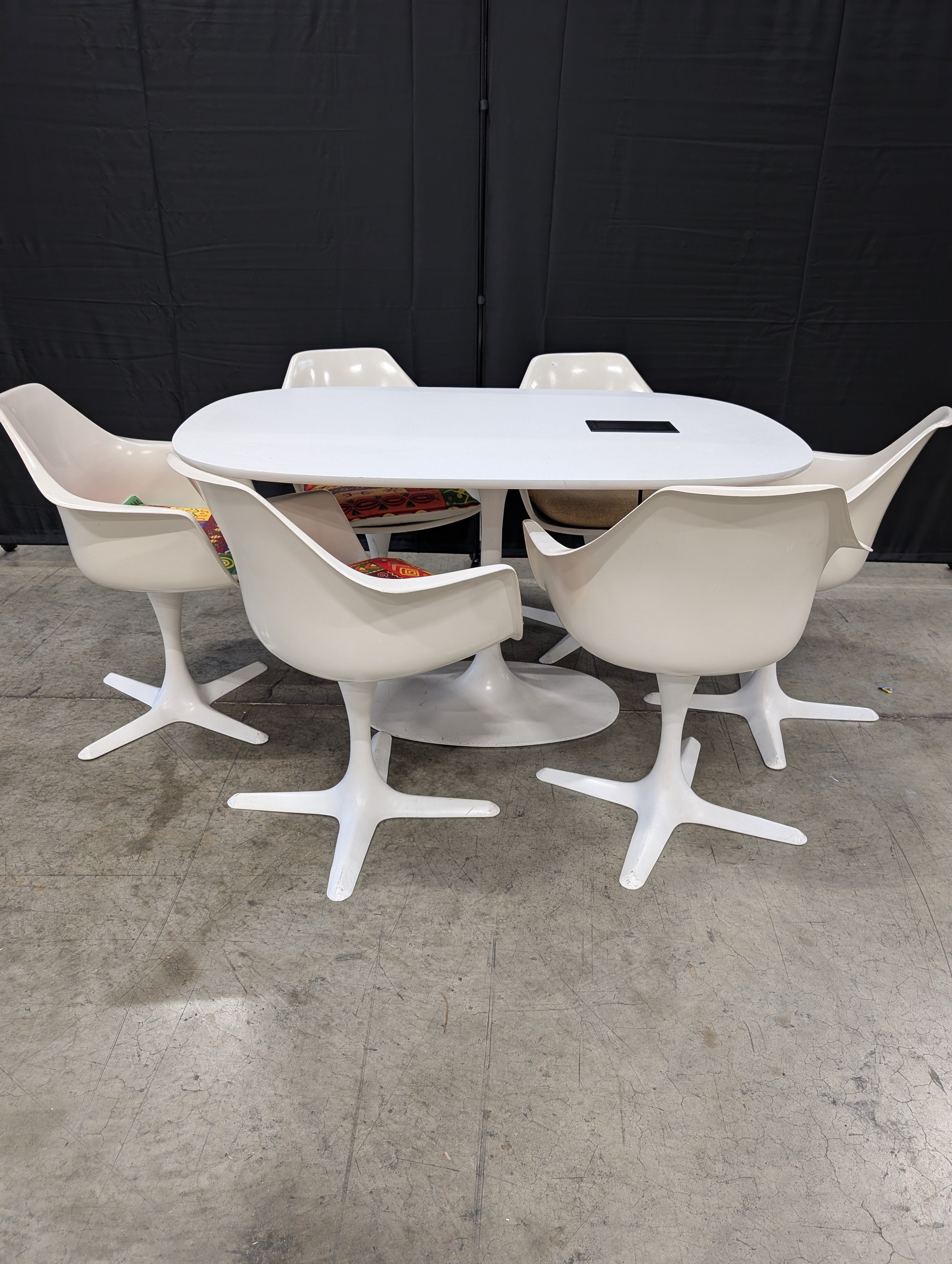 White Oval Table with Six Pedestal Chairs with Cable Cubby