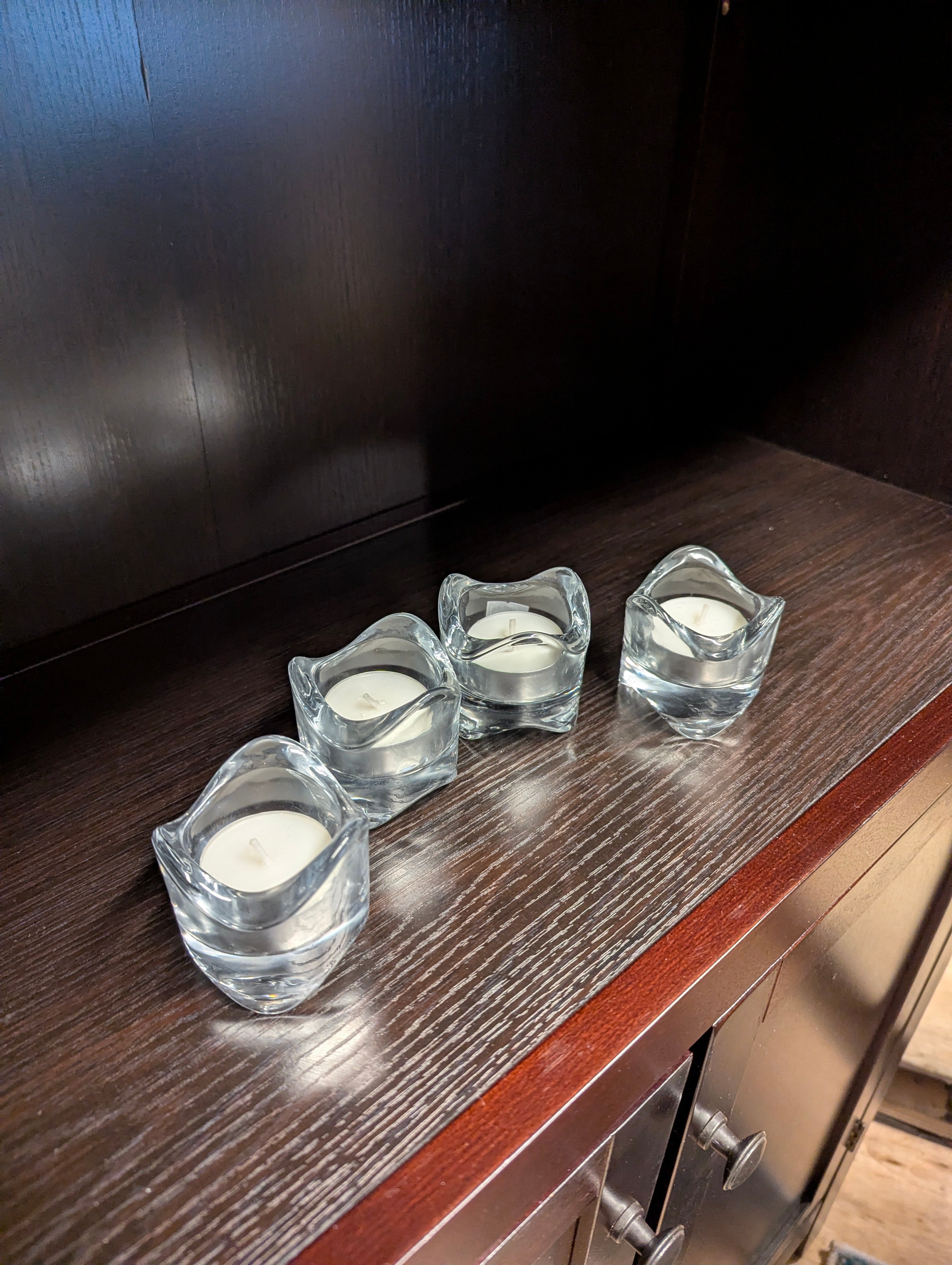 Set of Four Clear Glass Votive Candle Holders with Wavy Design