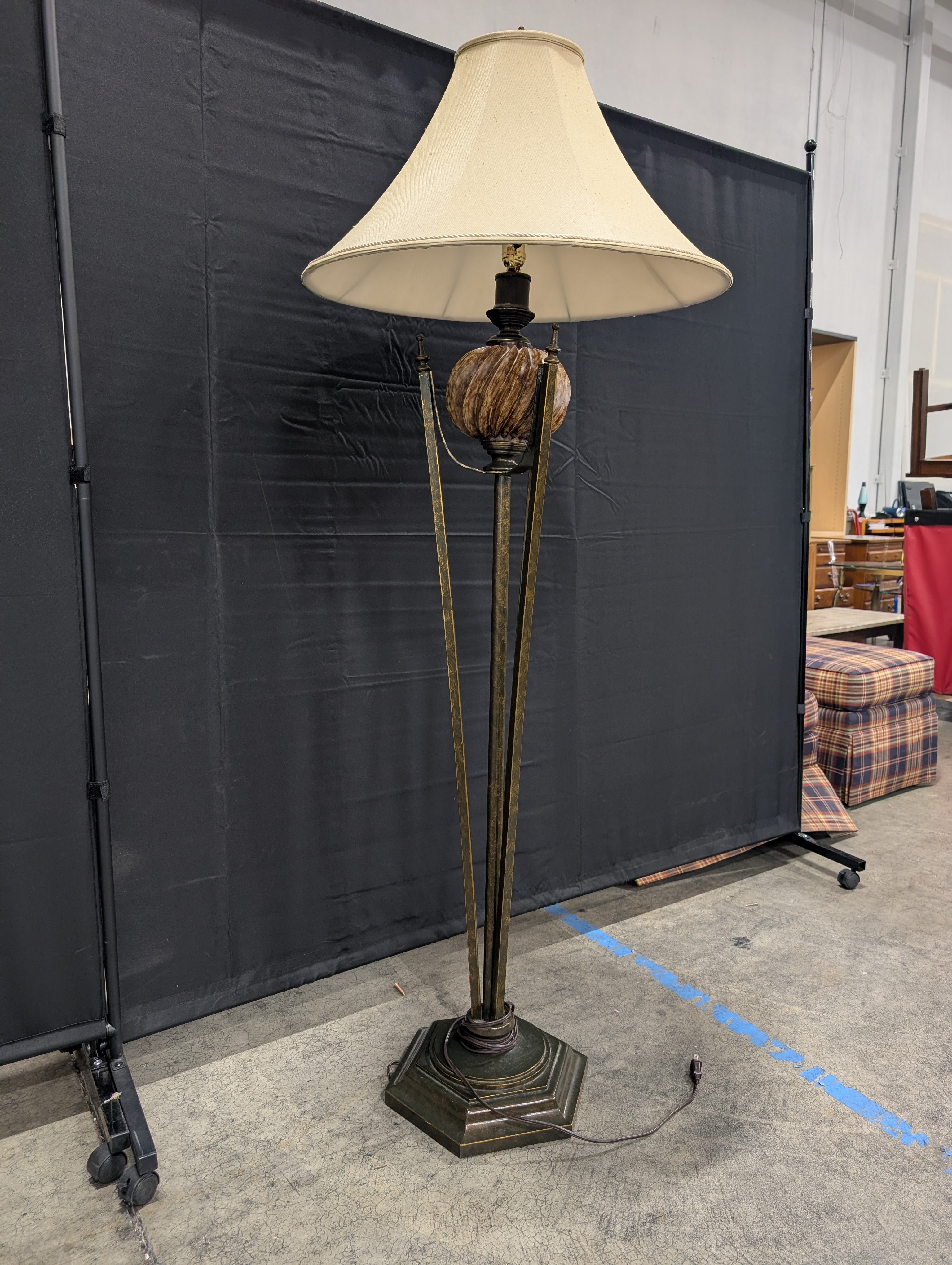 Dark Metal Three-Legged Floor Lamp with Cream Shade