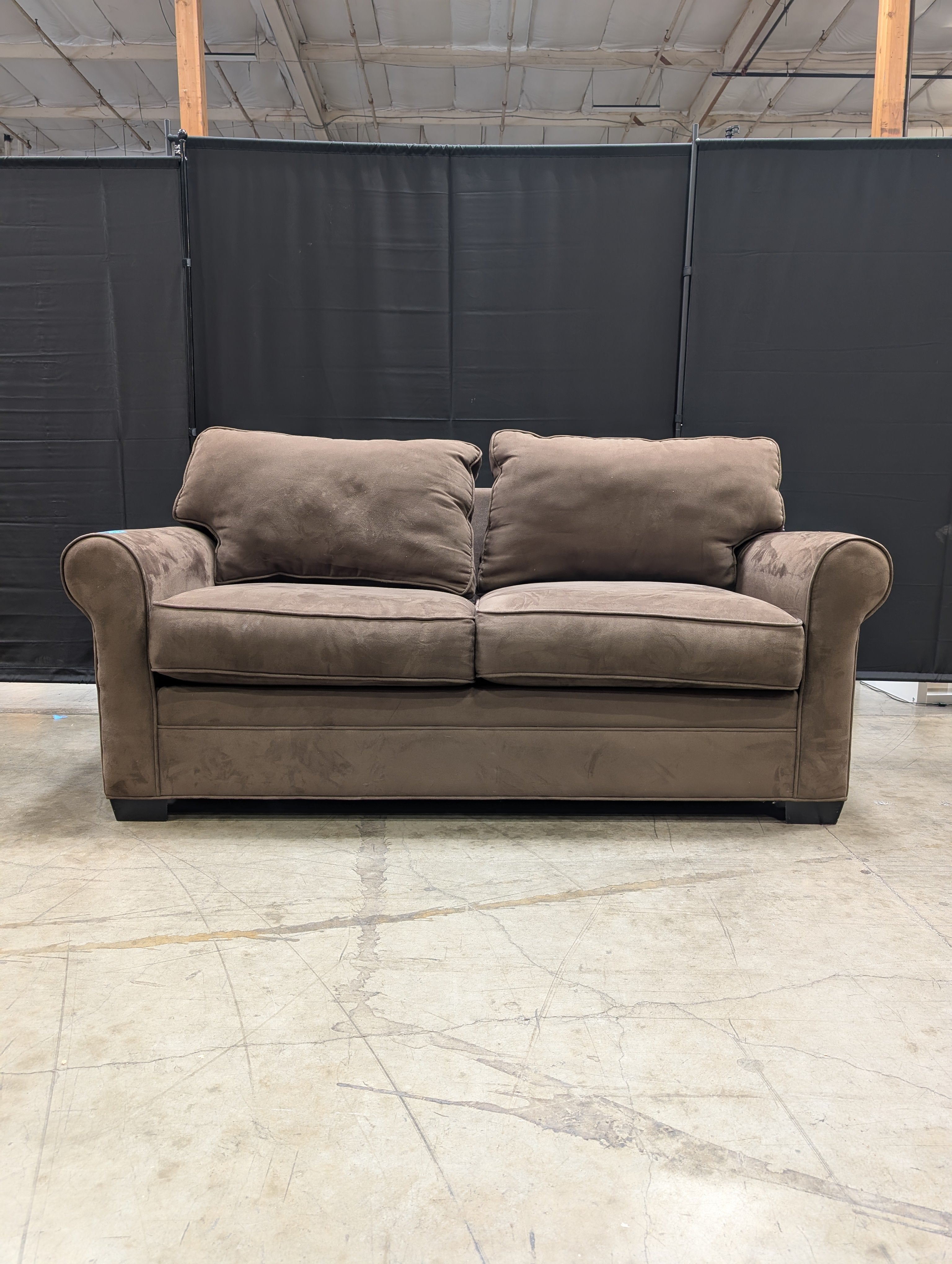 Plush Brown Two-Seater Sofa with Rolled Arms