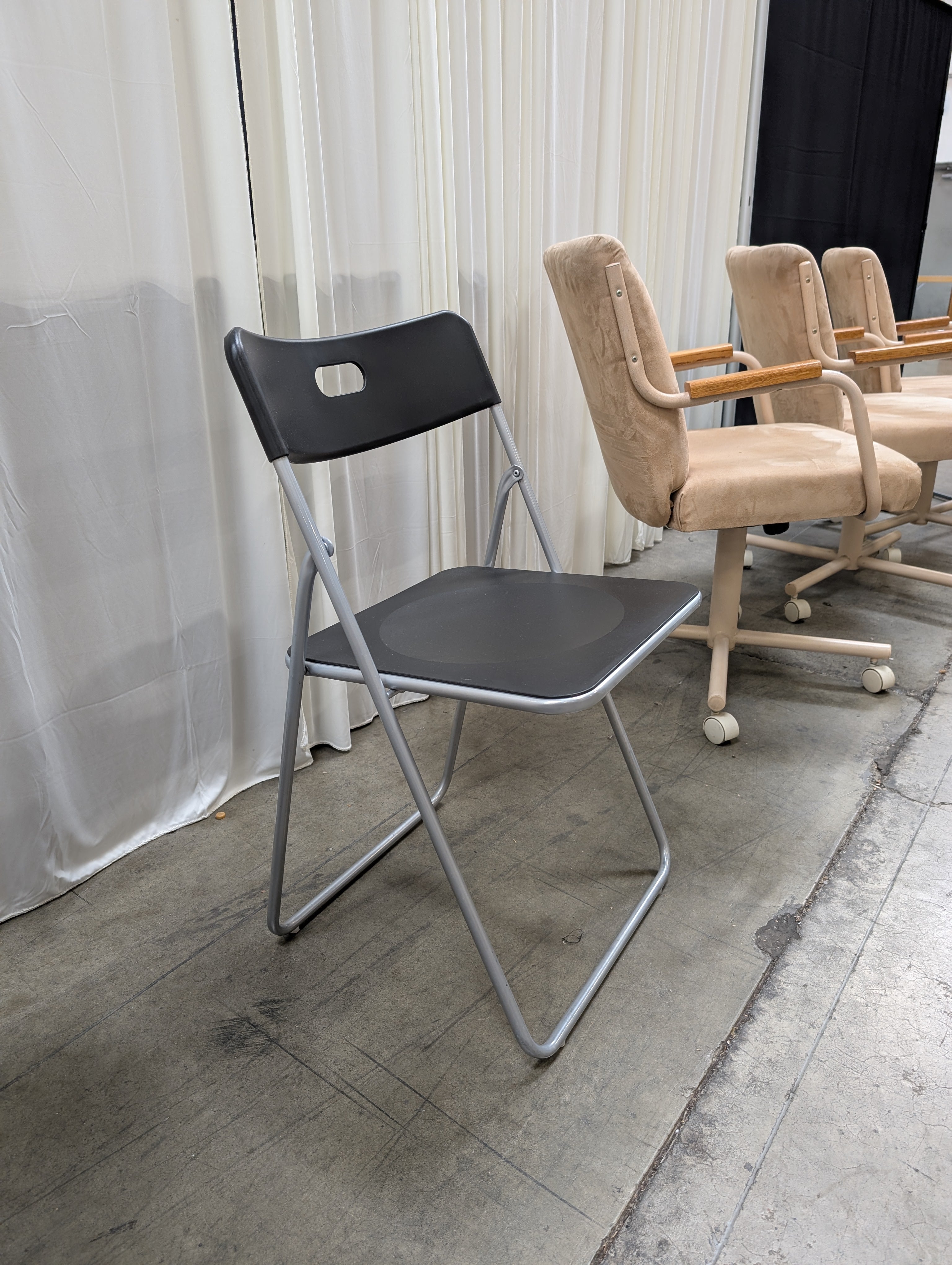 Black Metal Folding Chairs with Integrated Handles