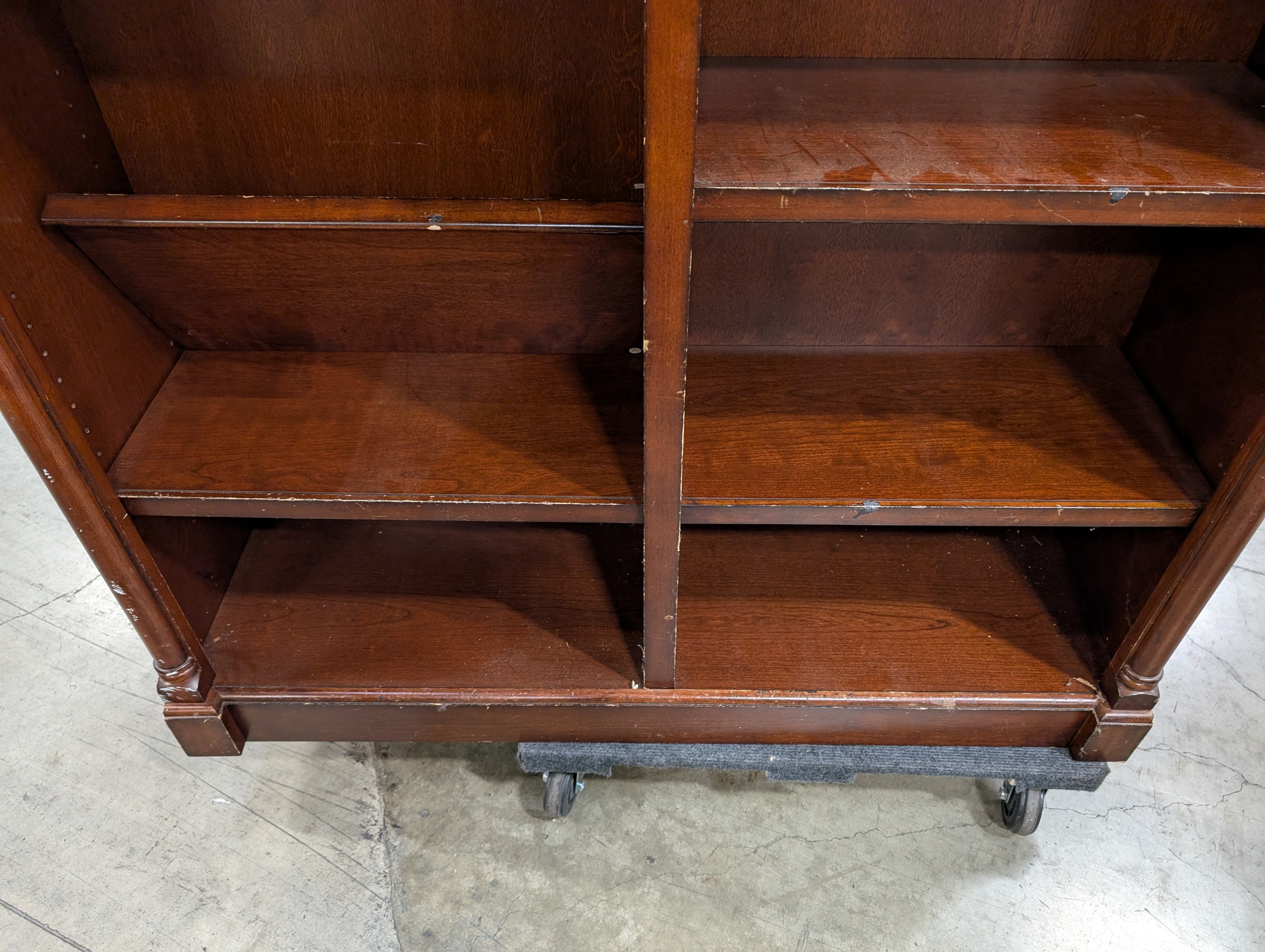 Traditional Dark Wood Bookcase with Arched Top Sections