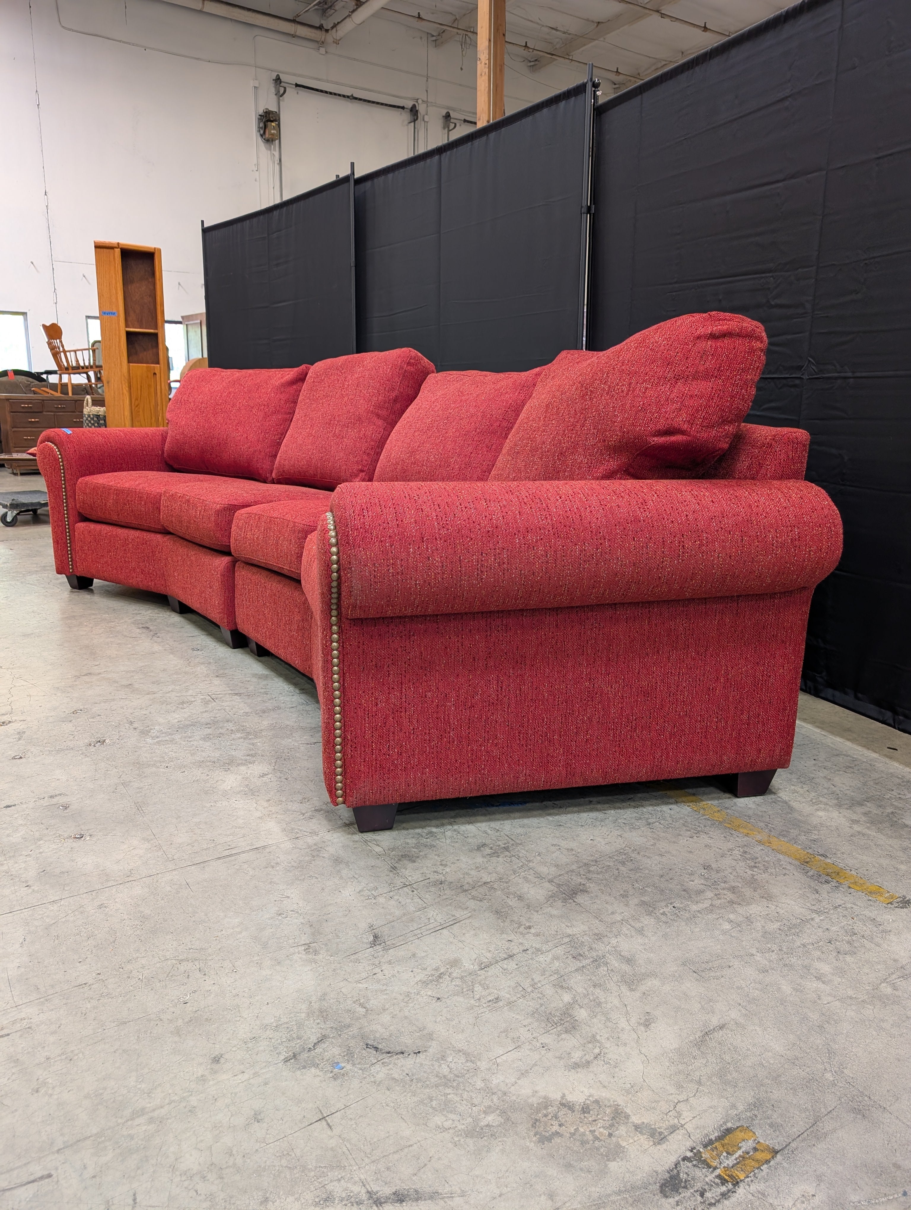 Curved Red Textured Fabric Couch with Nailhead Trim