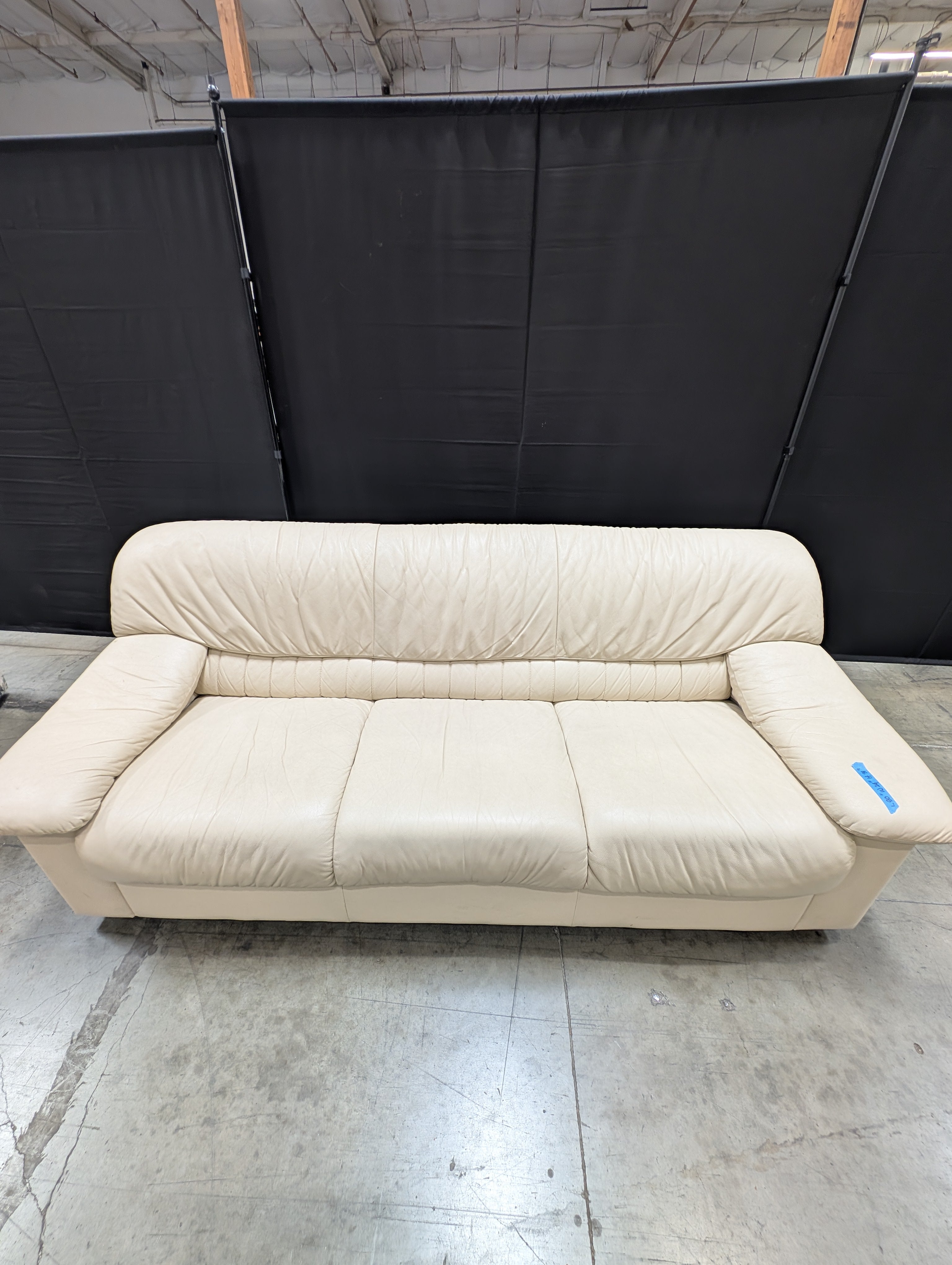 Cream Natuzzi Three-Seater Upholstered Sofa