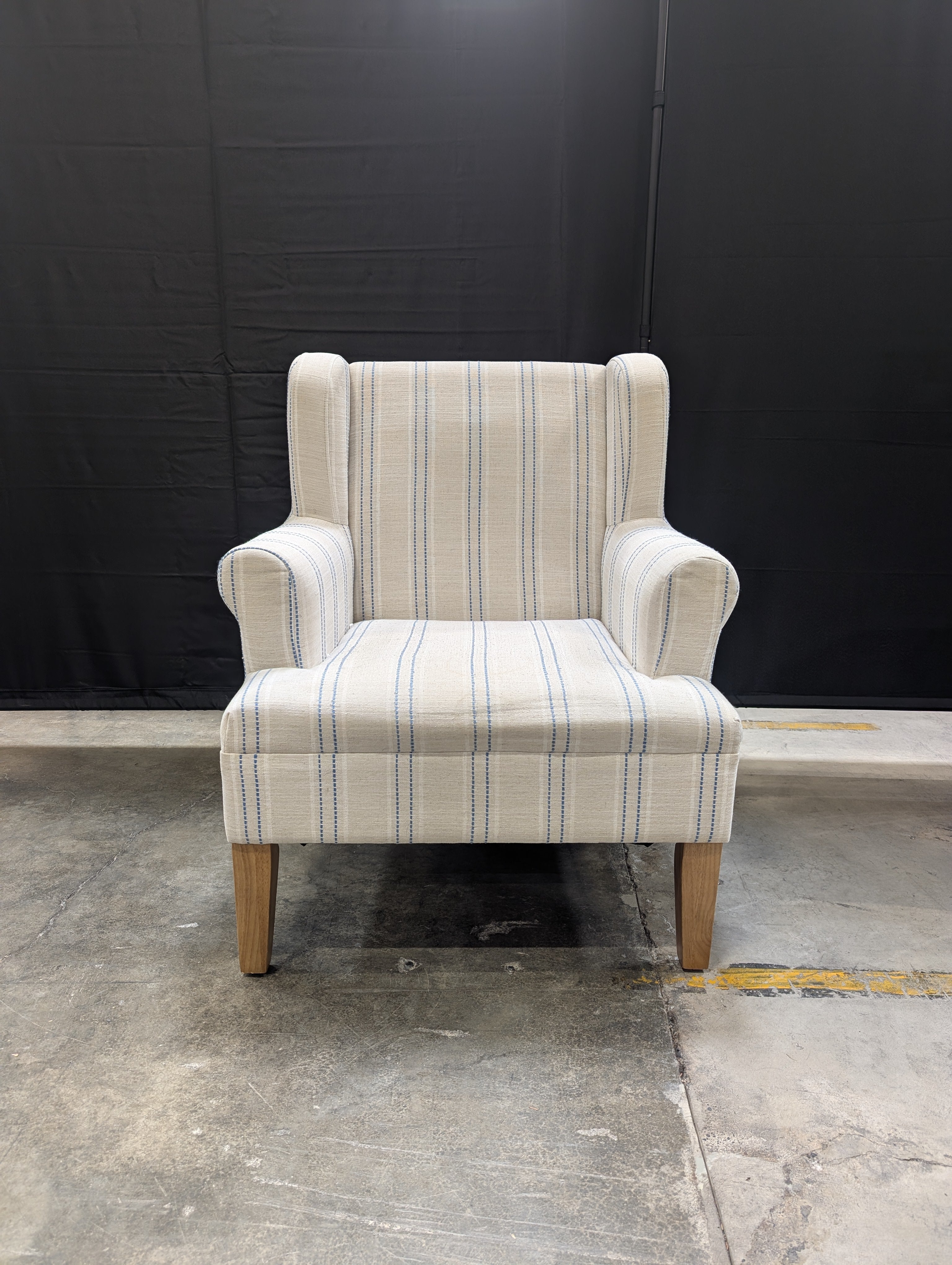 Upholstered Wingback Armchair with Blue Stripes