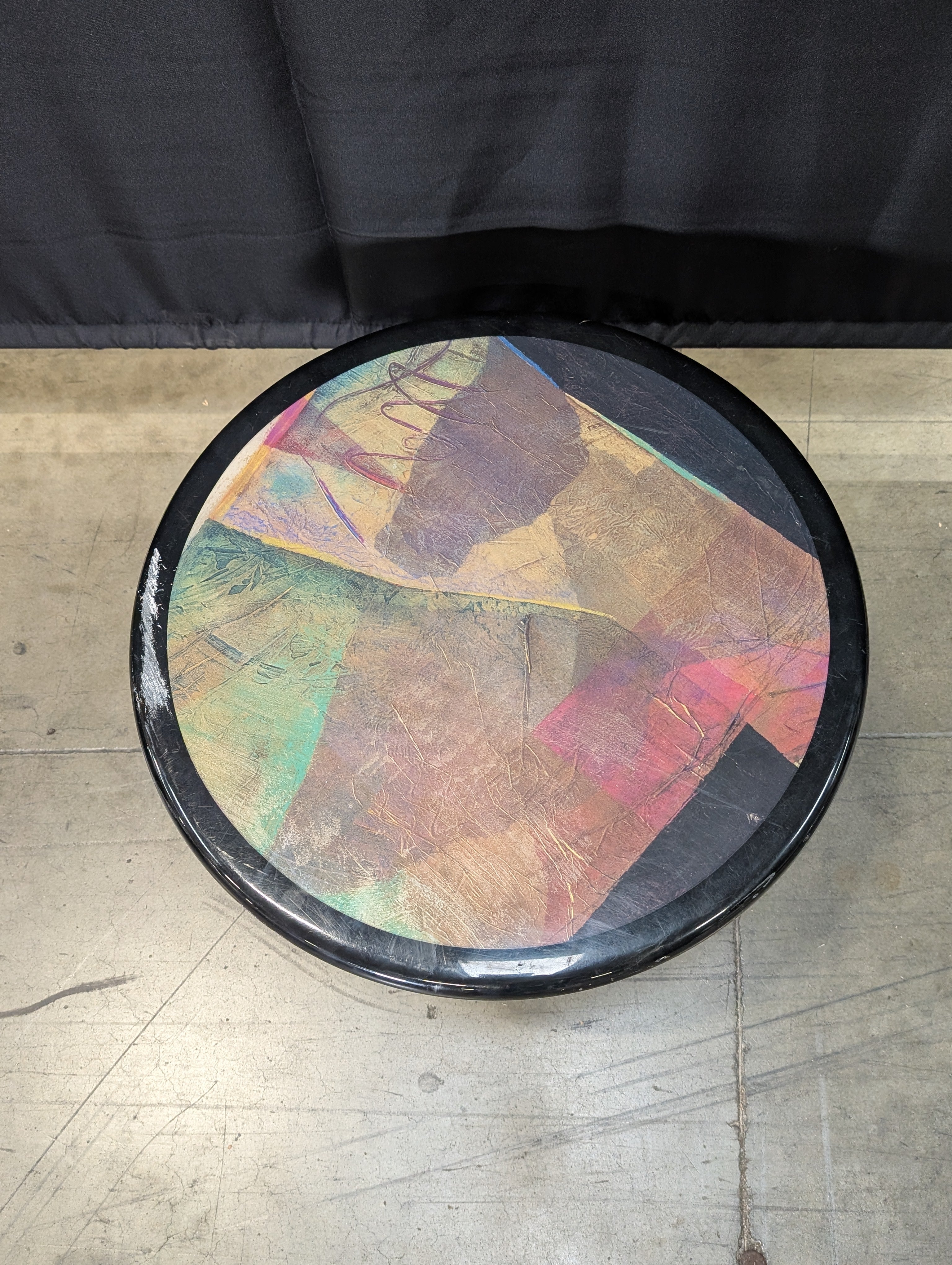Striking Round Pedestal Coffee Table with Iridescent Top