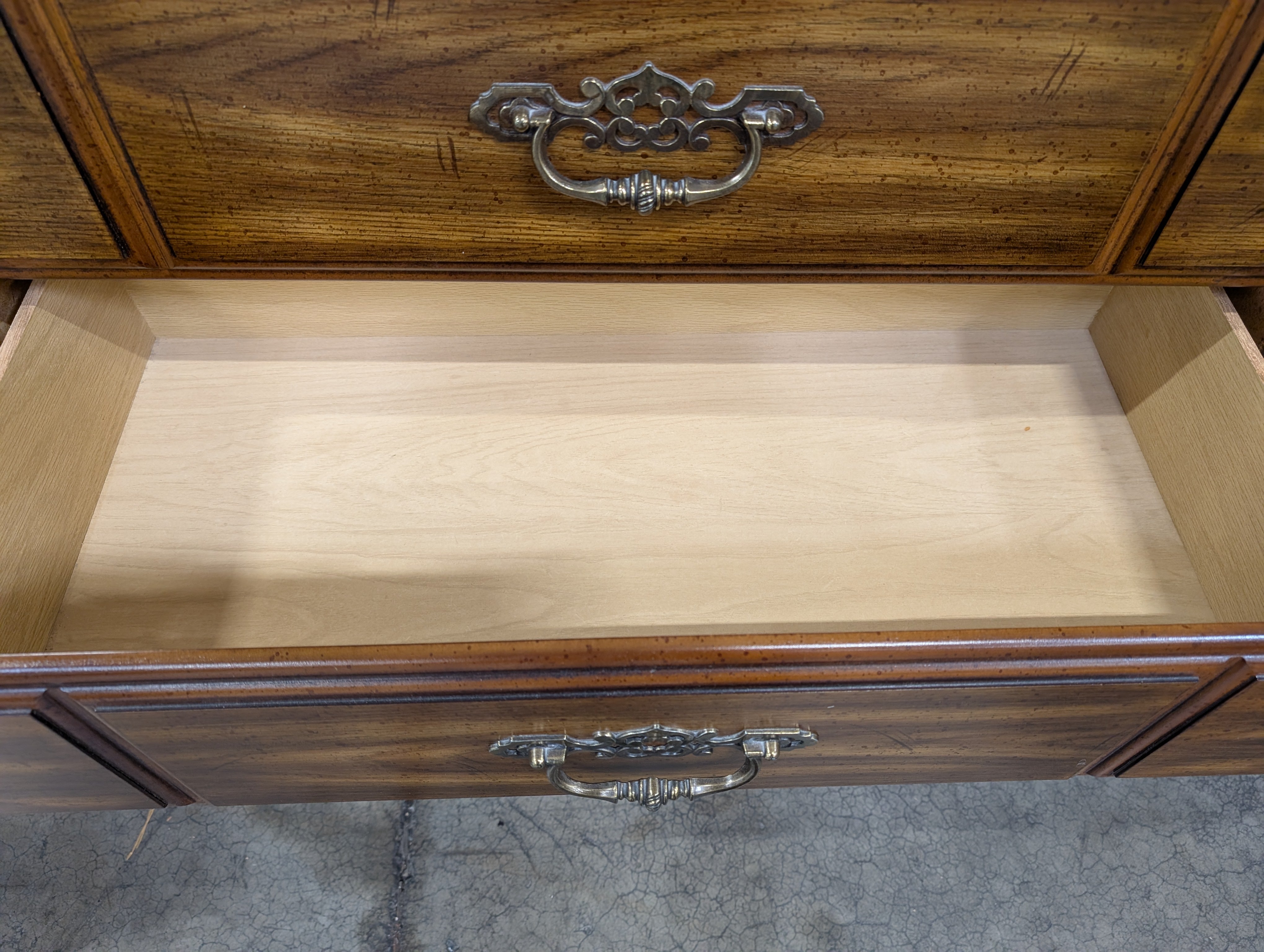 Traditional Dark Wood Five-Drawer Chest with Ornate Pulls