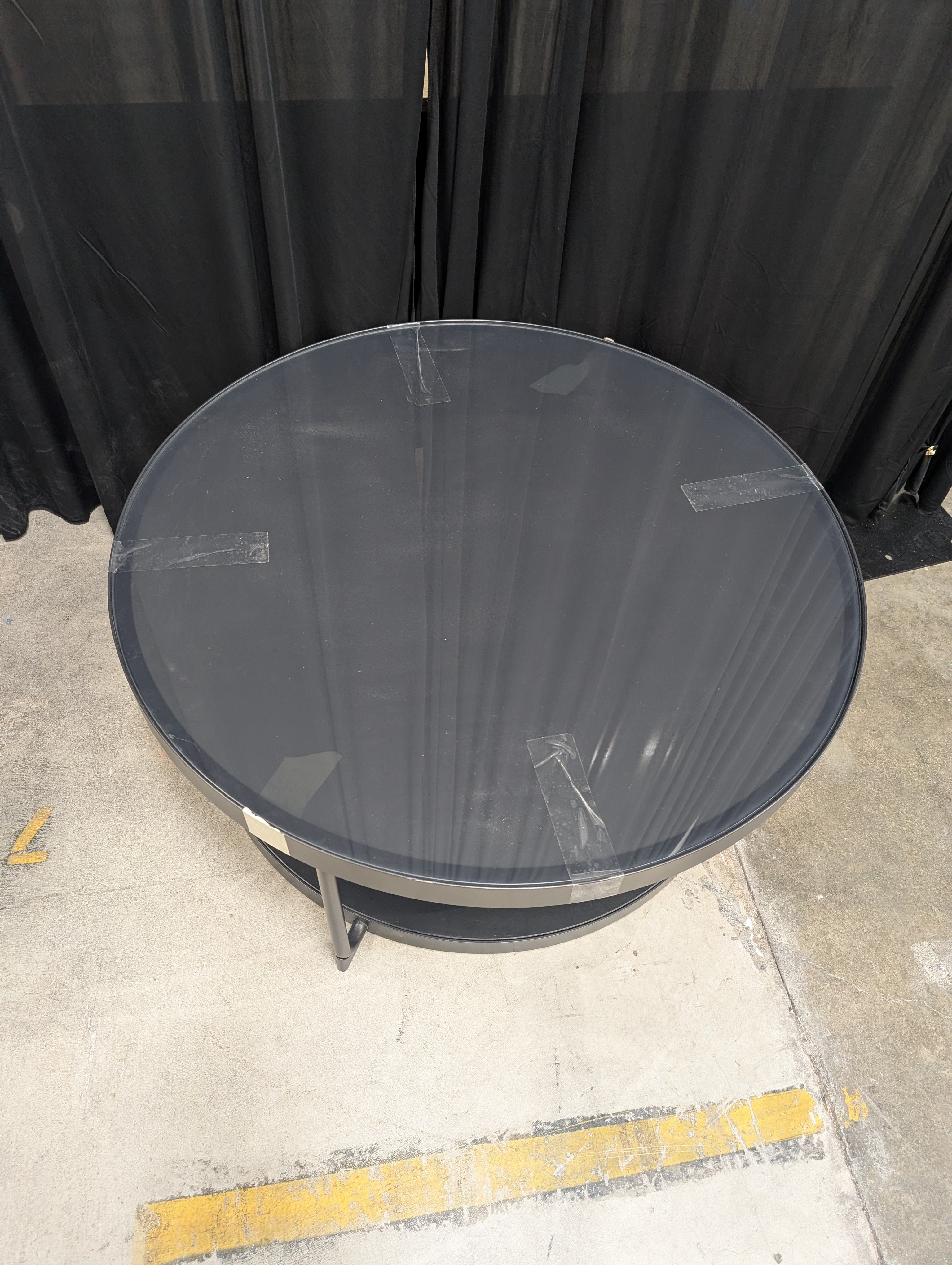 Round Glass top Coffee Table with Dark Metal Base