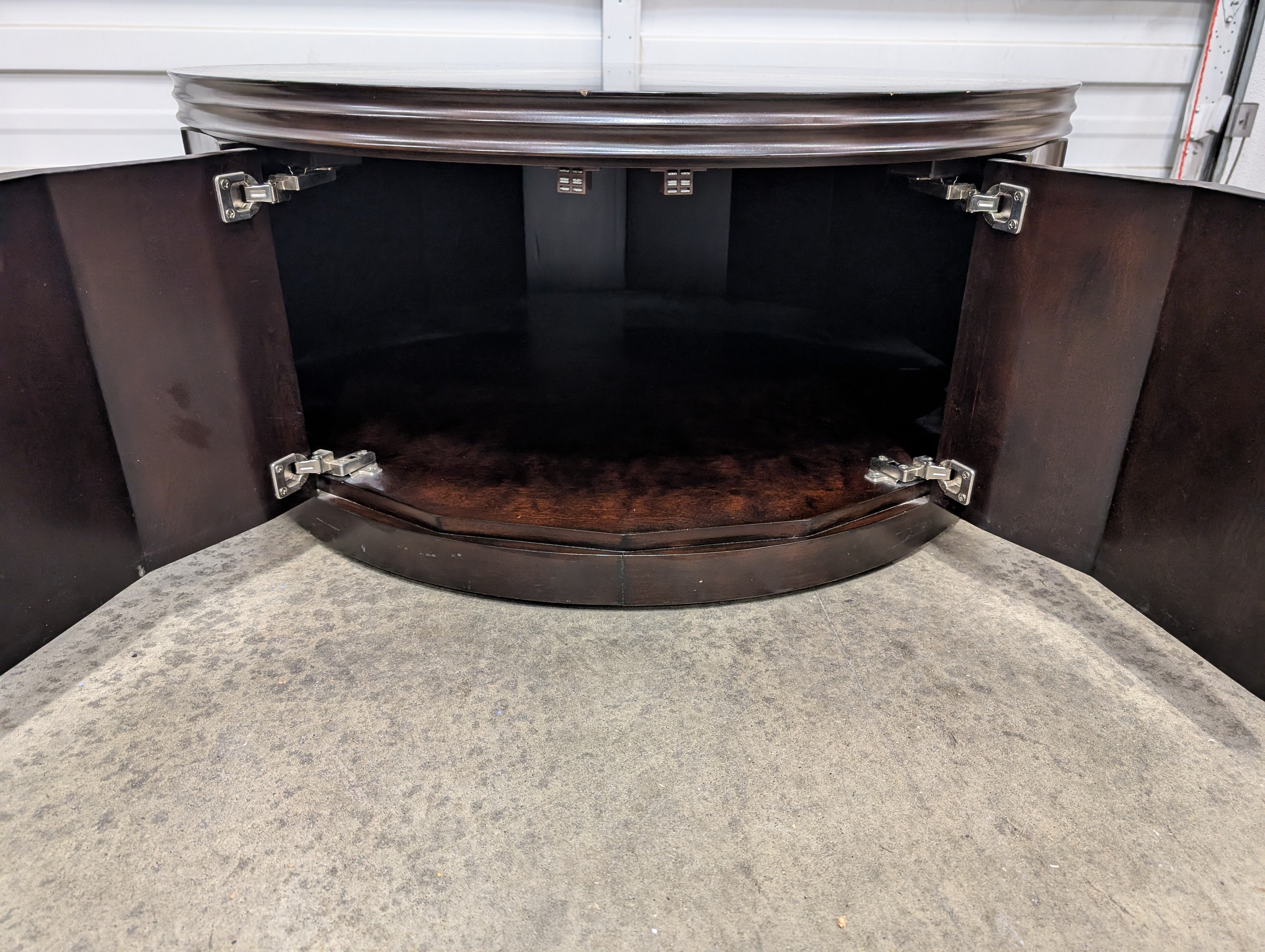 Circular Dark Wood Coffee Table with Paneled Sides