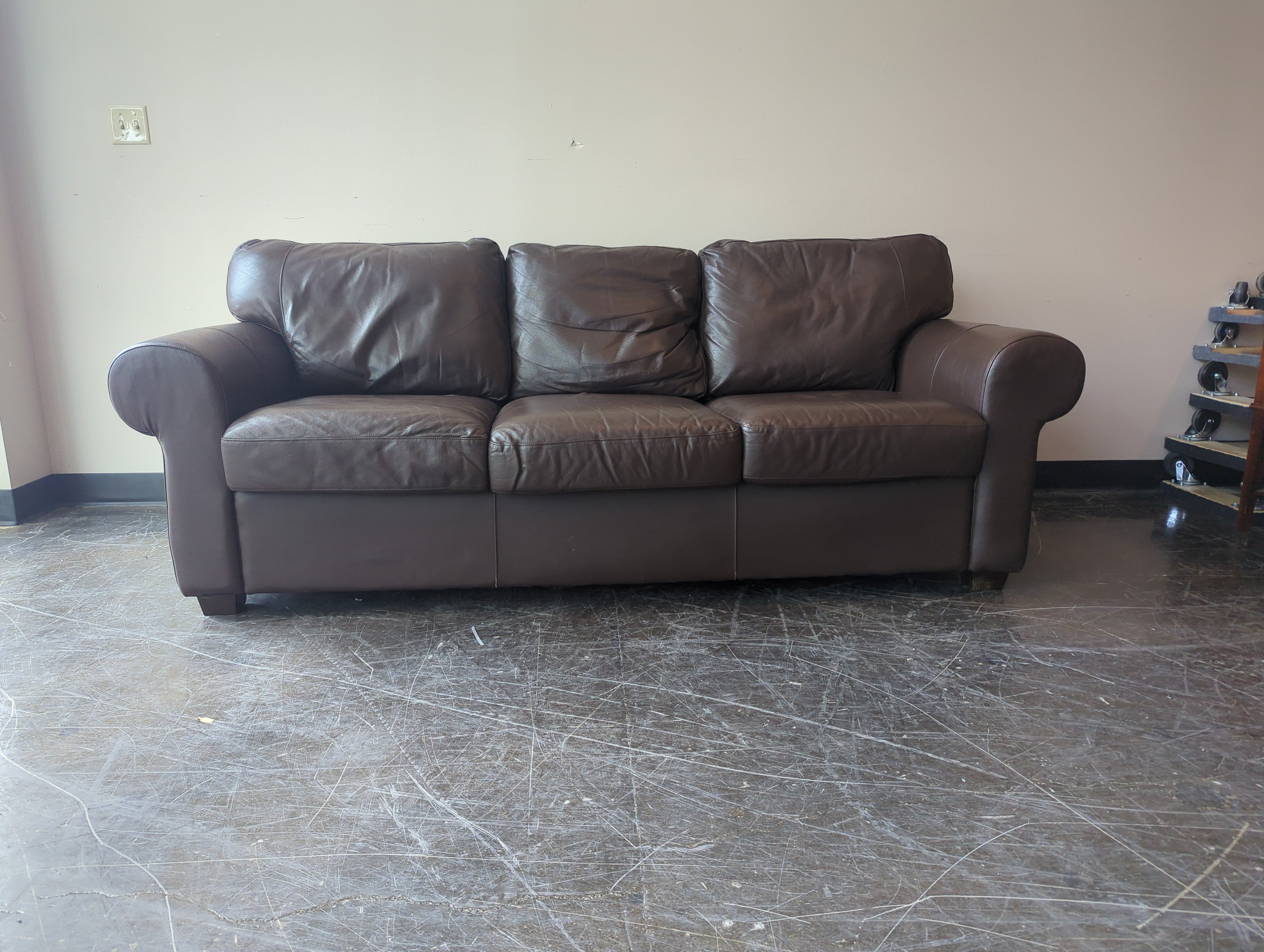 Brown Three Seater couch