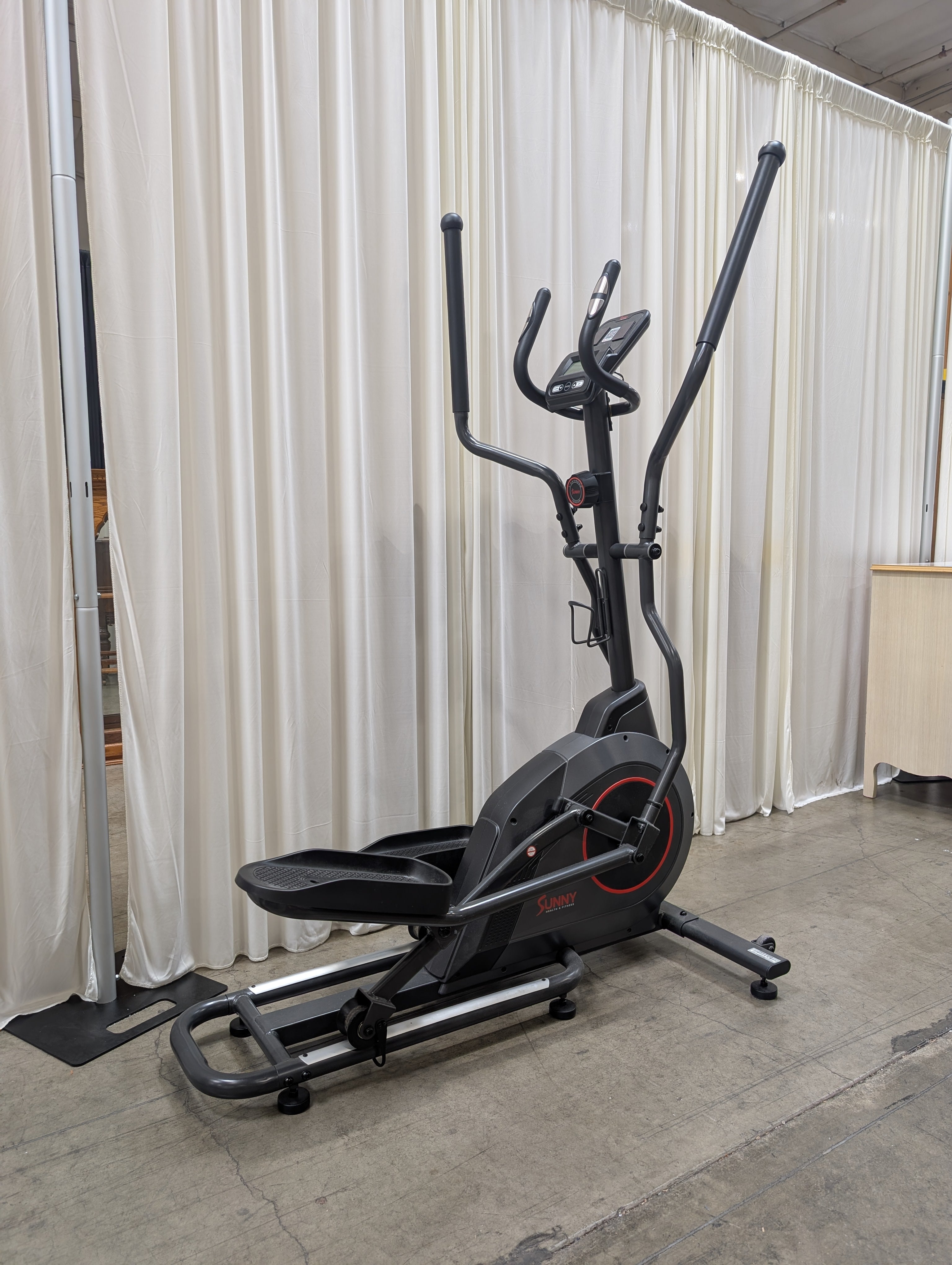 Black Magnetic Elliptical Trainer with Red Accents