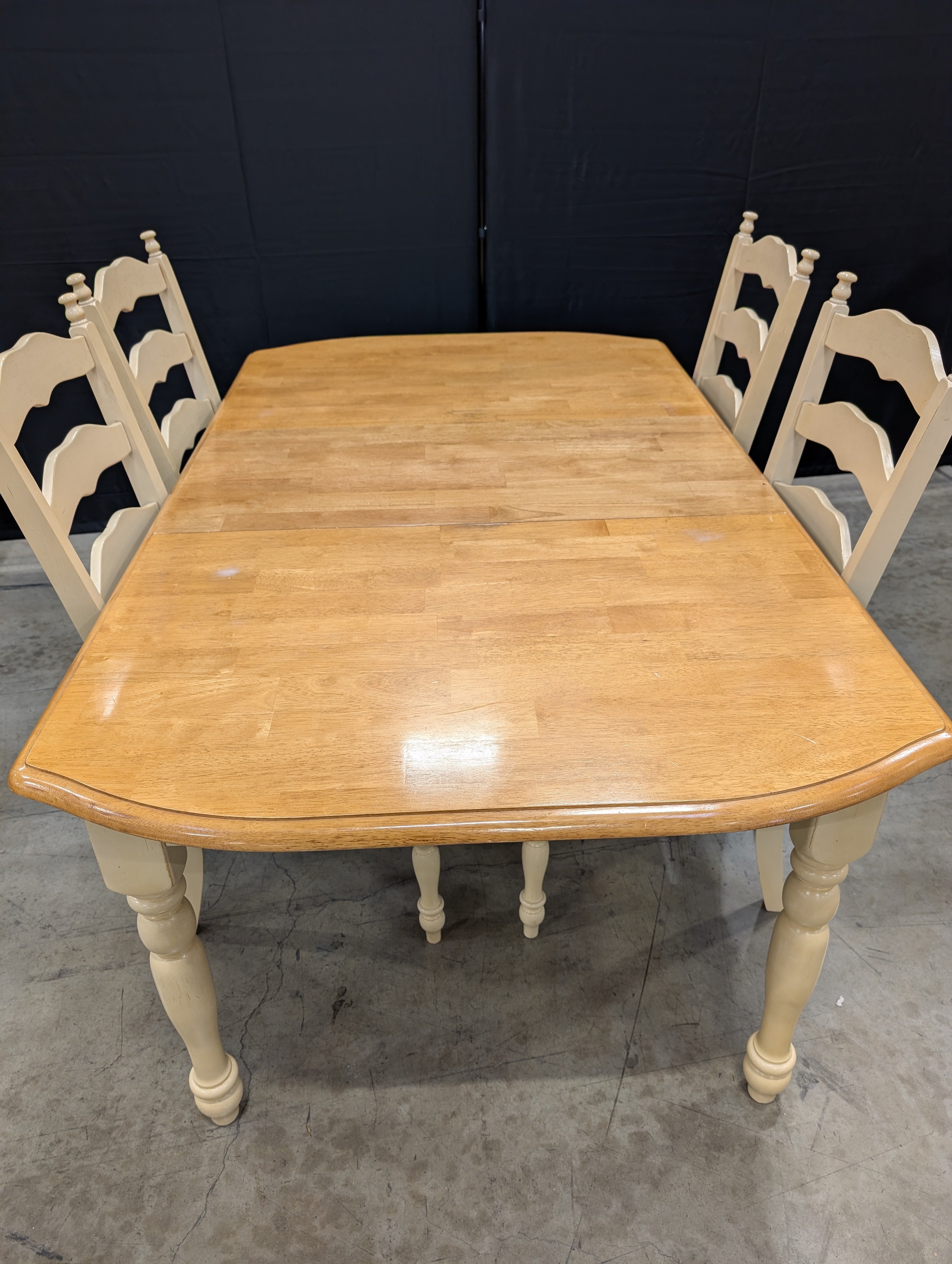 Rustic Wood Dining Table with Four Ladder-Back Chairs