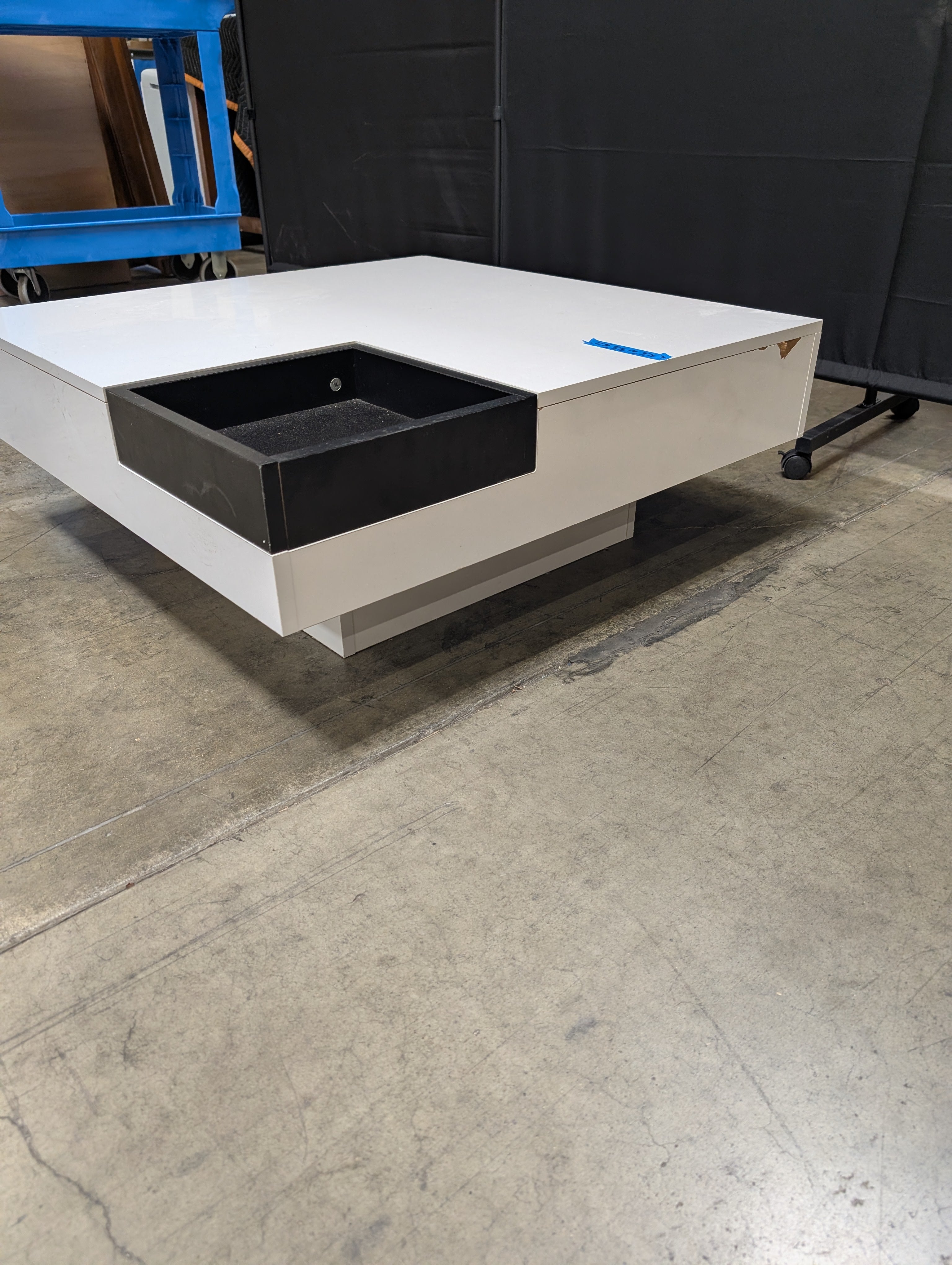 Contemporary High-Gloss White Coffee Table with Black Recessed Compartment