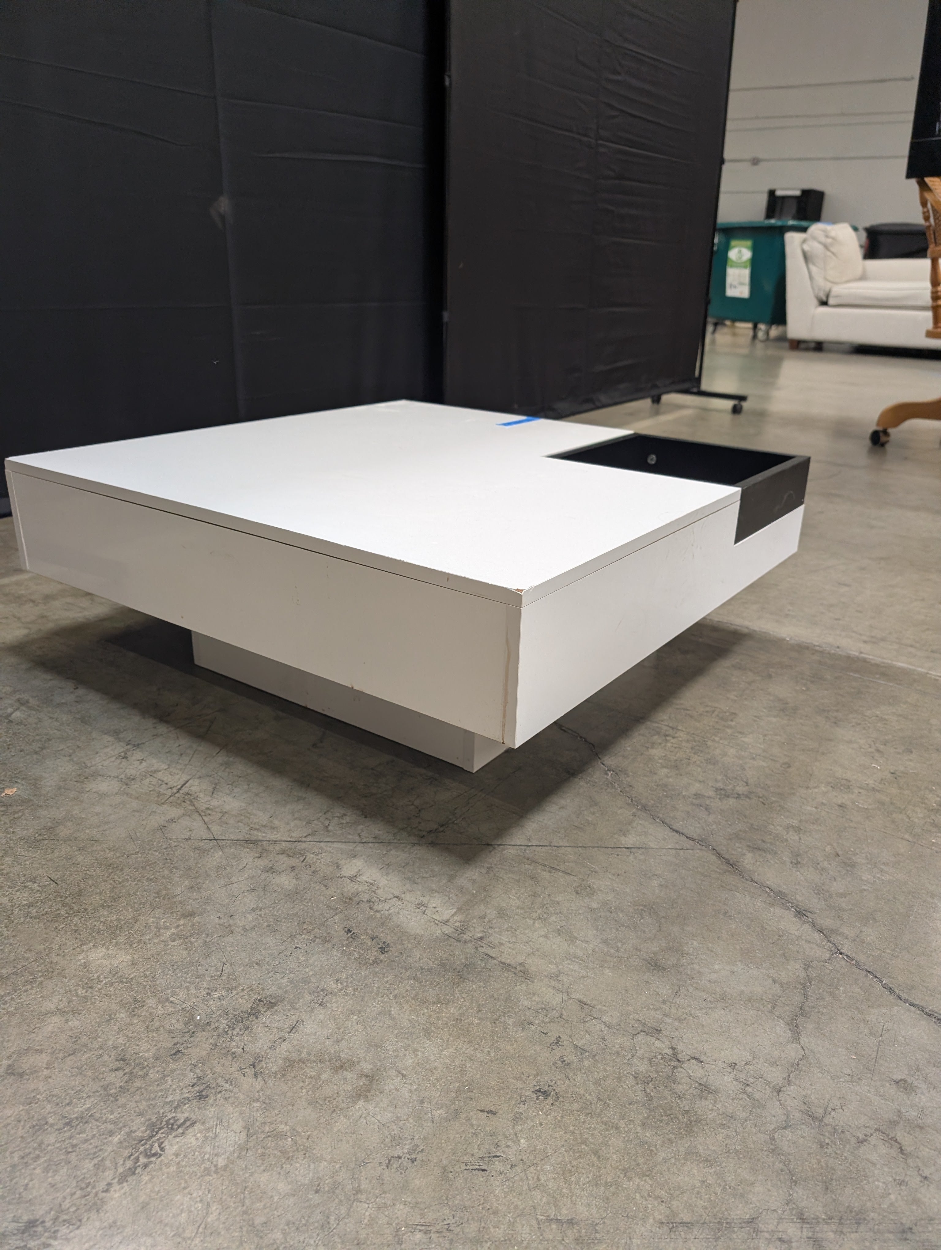 Contemporary High-Gloss White Coffee Table with Black Recessed Compartment