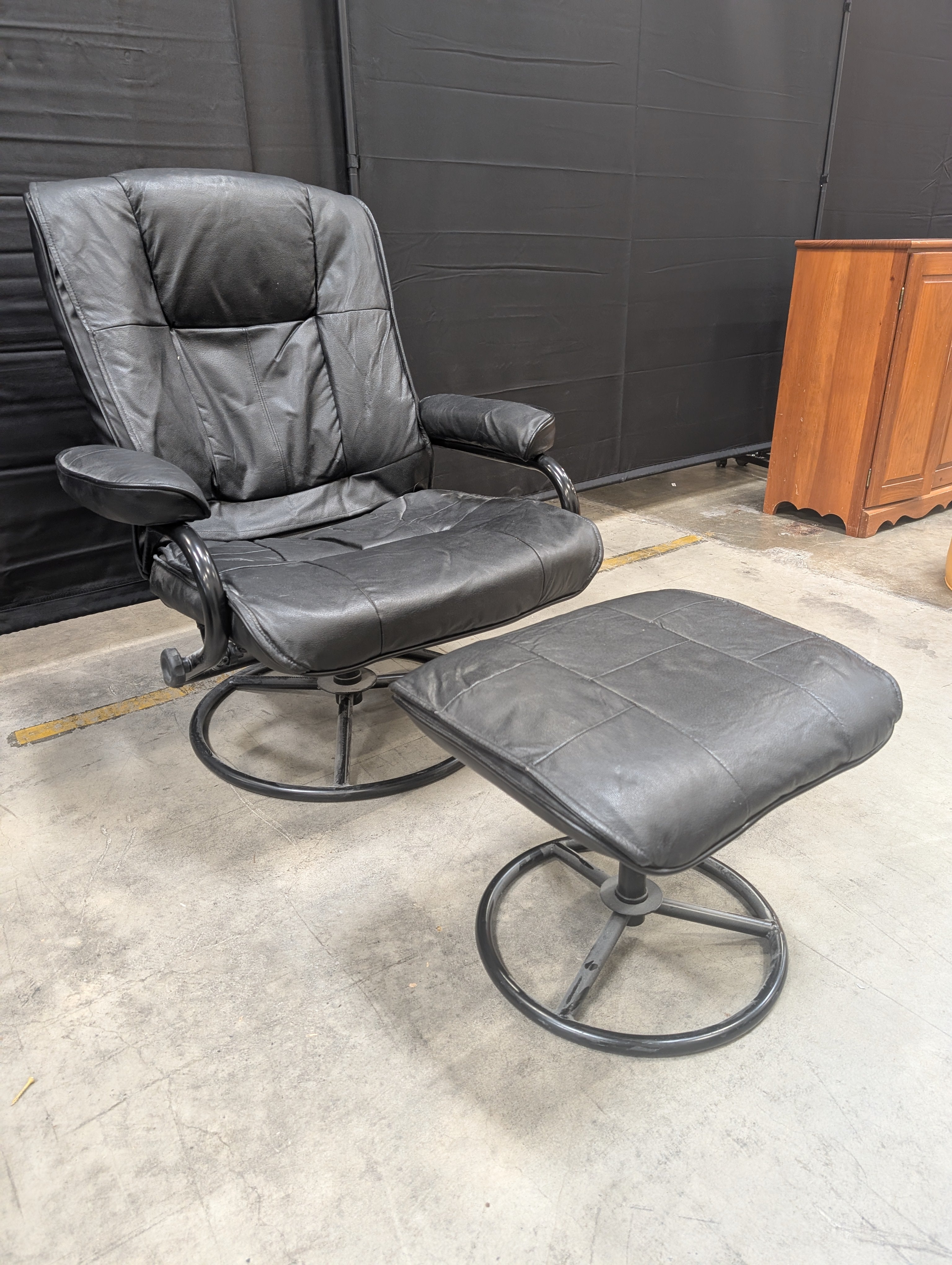 Padded Black Recliner with Ottoman