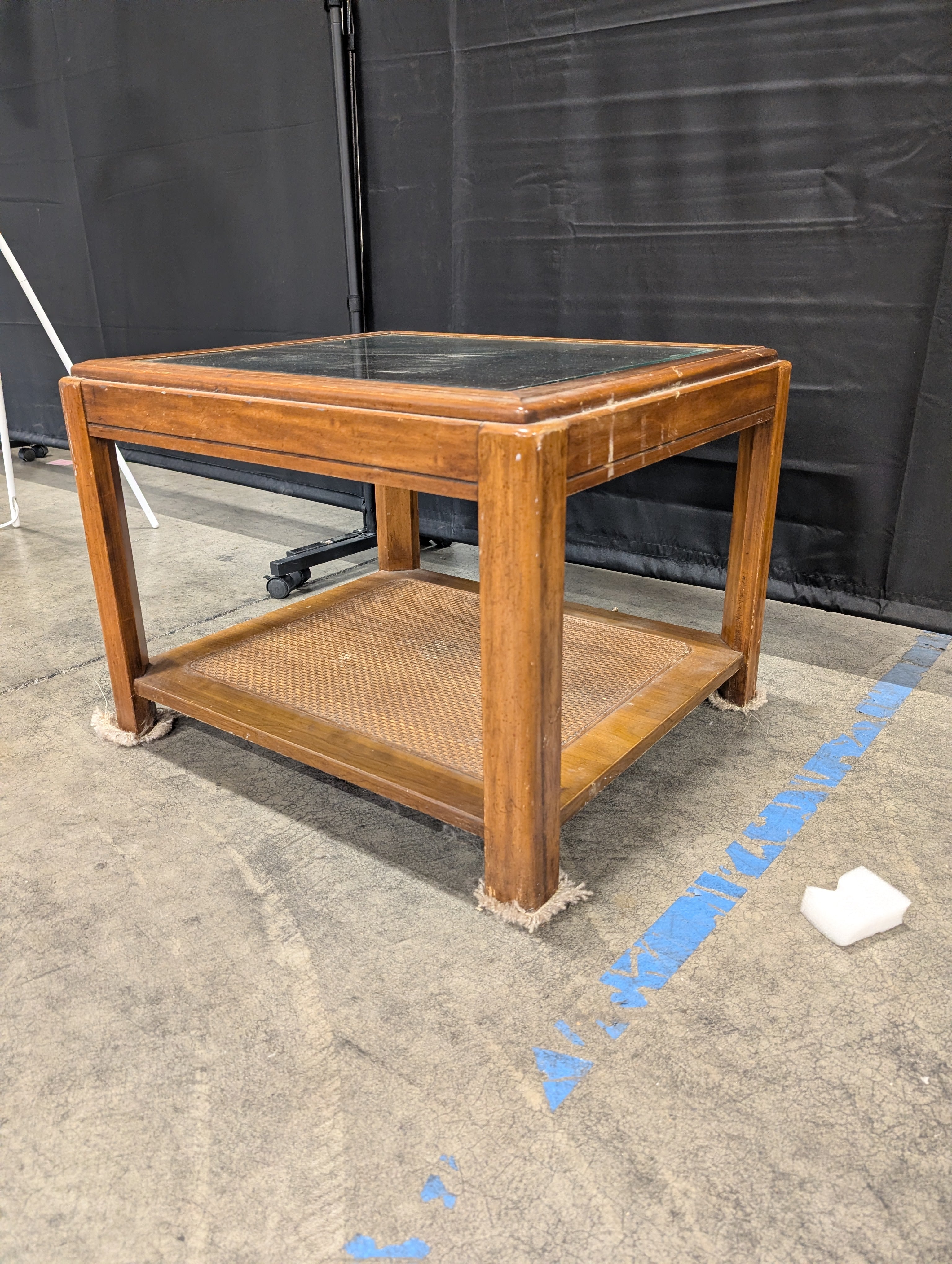 Brown Wood and Glass End Table with Wicker Shelf