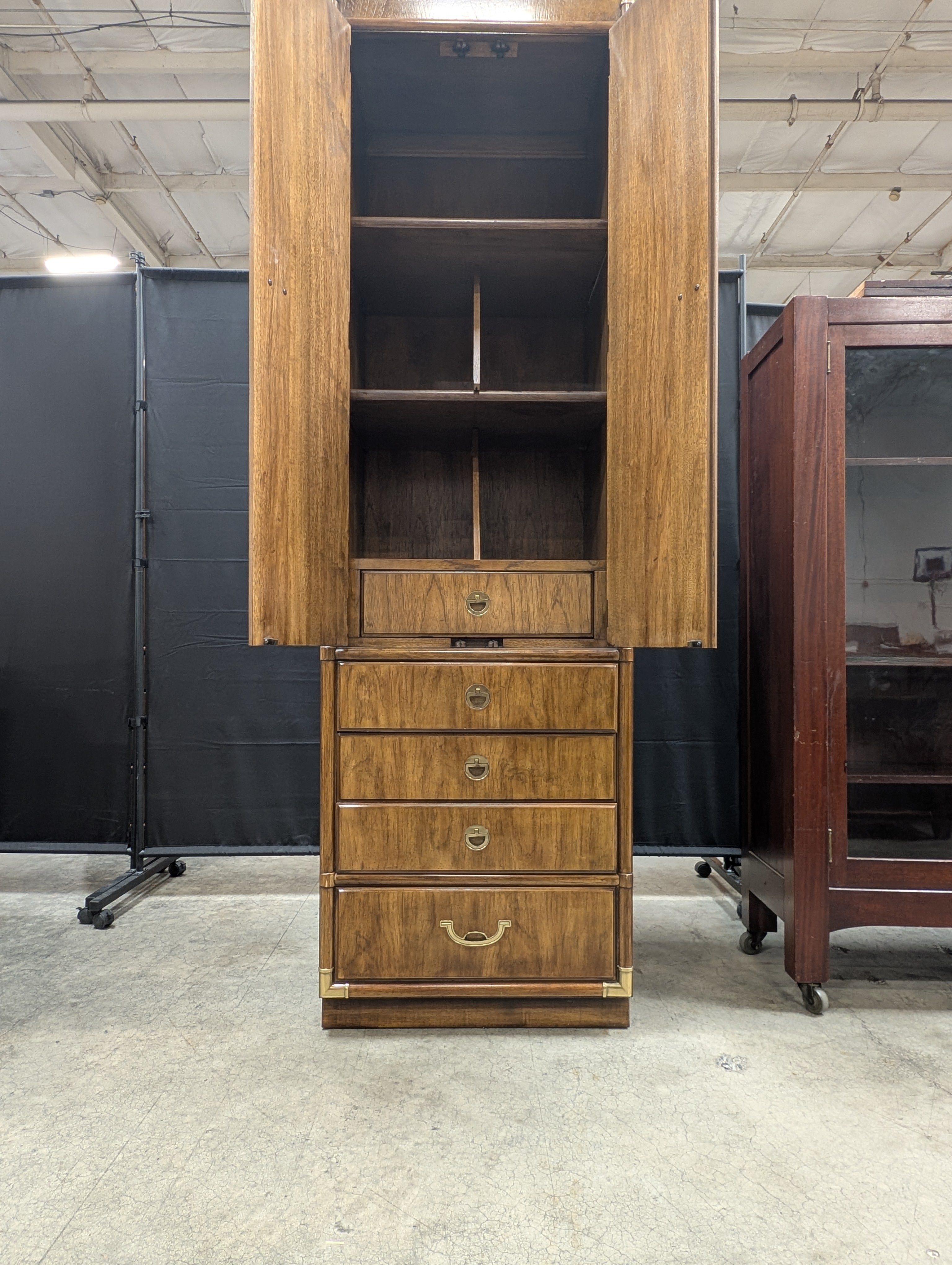 Tall Wooden Drexel Cabinet with Brass Accents and Multiple Drawers