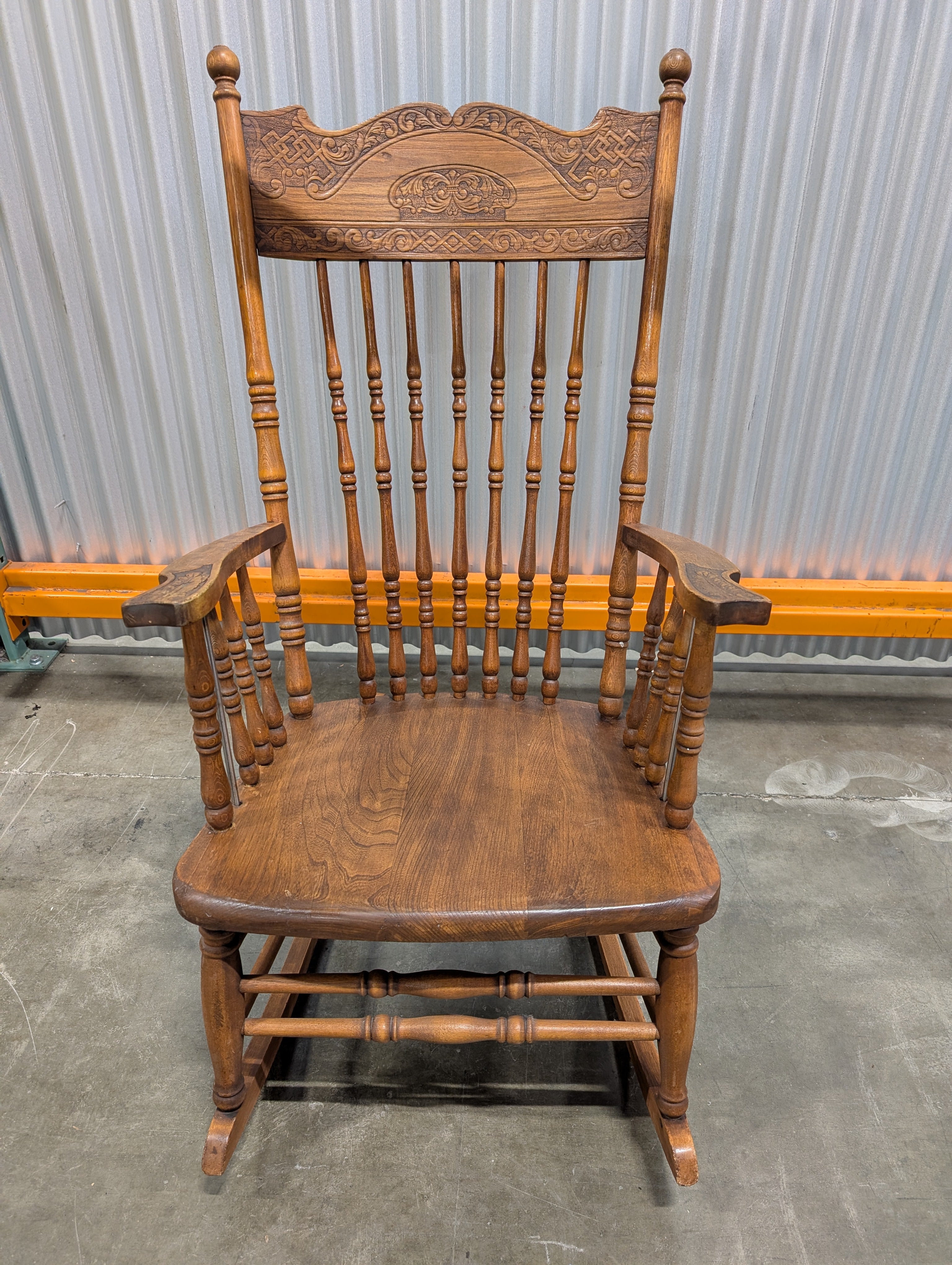 Intricate Carved Hardwood Rocking Chair
