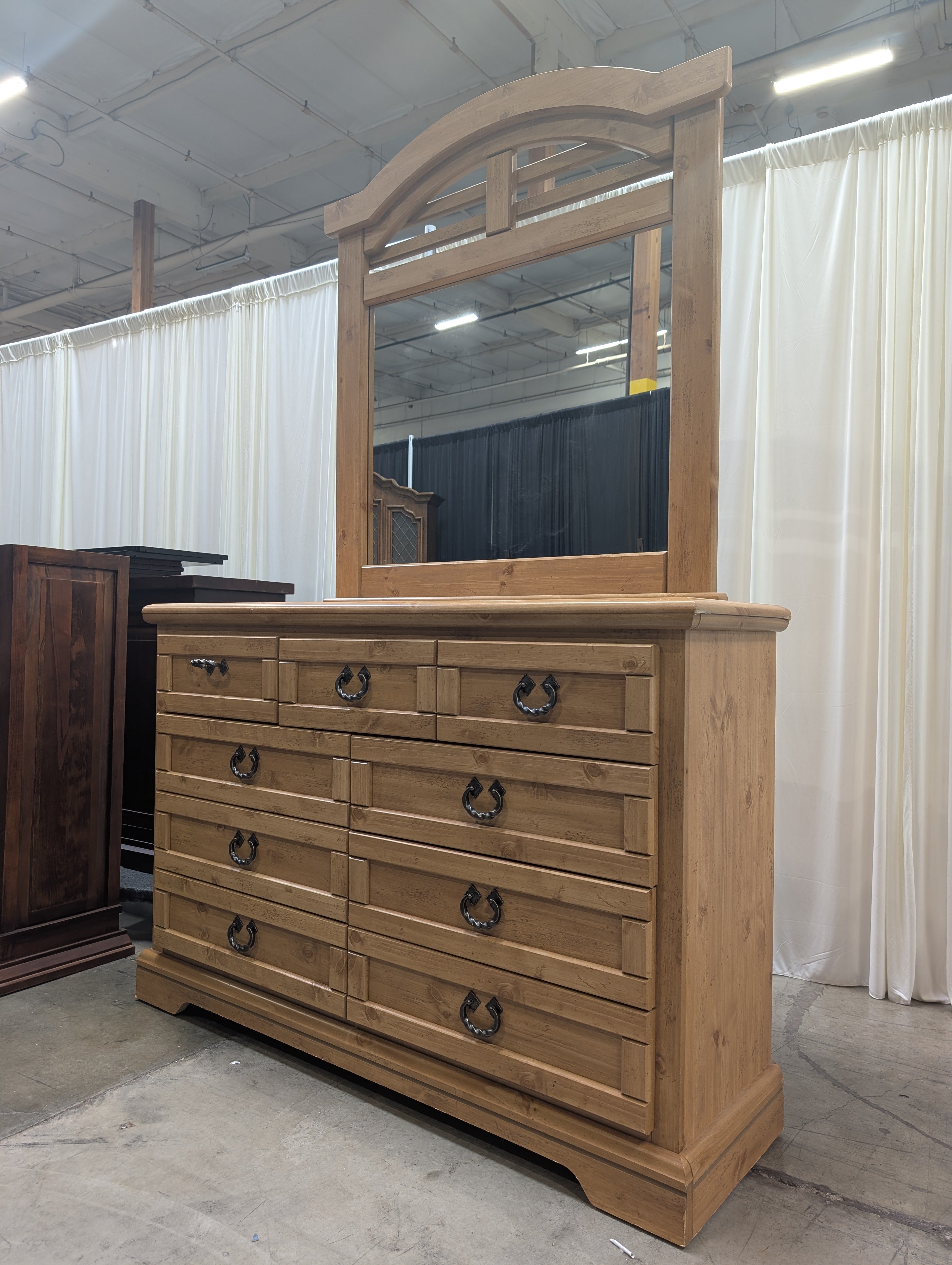 Rustic Light Wood 8-Drawer Dresser with Arched Mirror