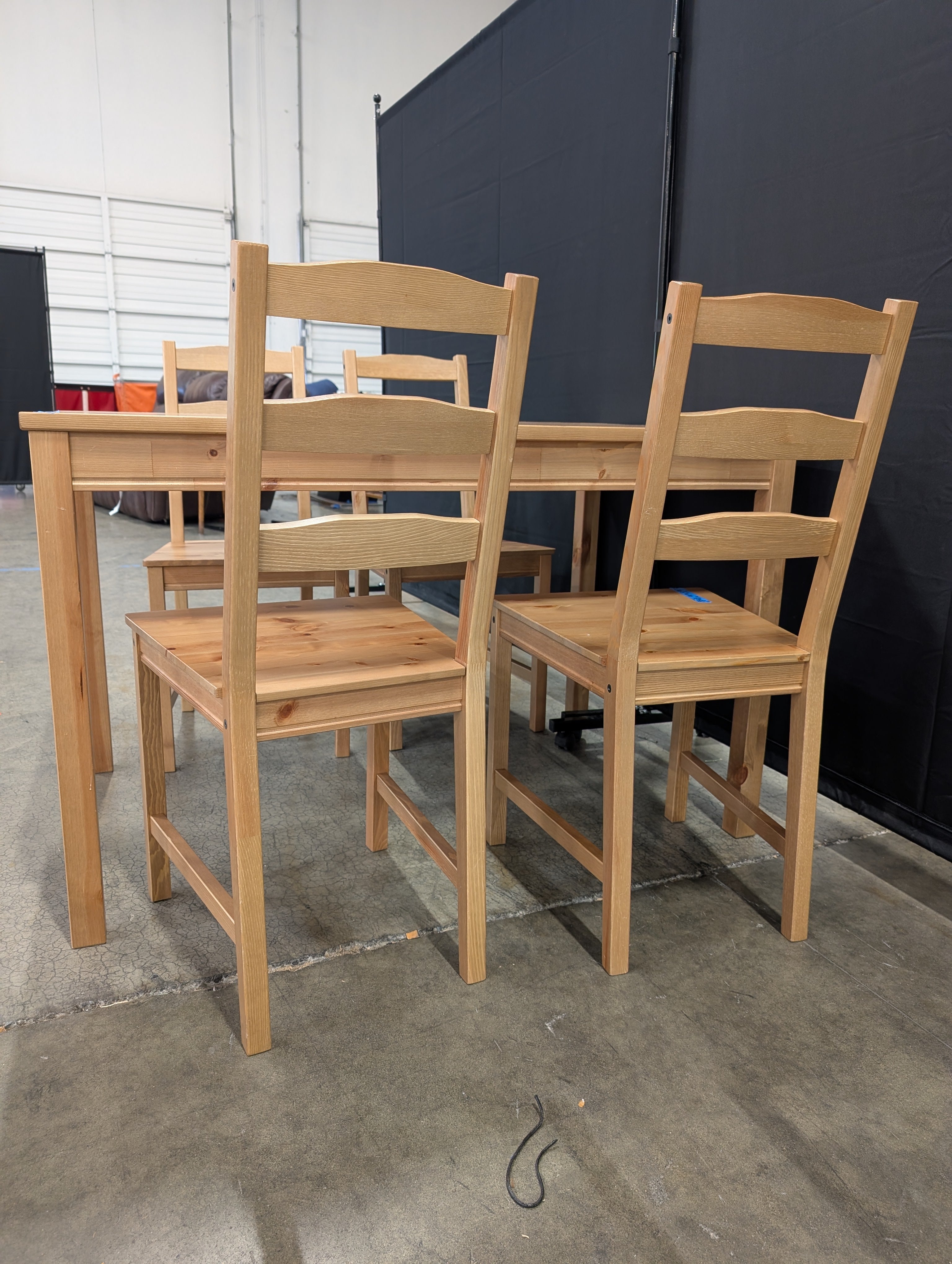 Natural Wood Plank Dining Table with Four Ladder Back Chairs