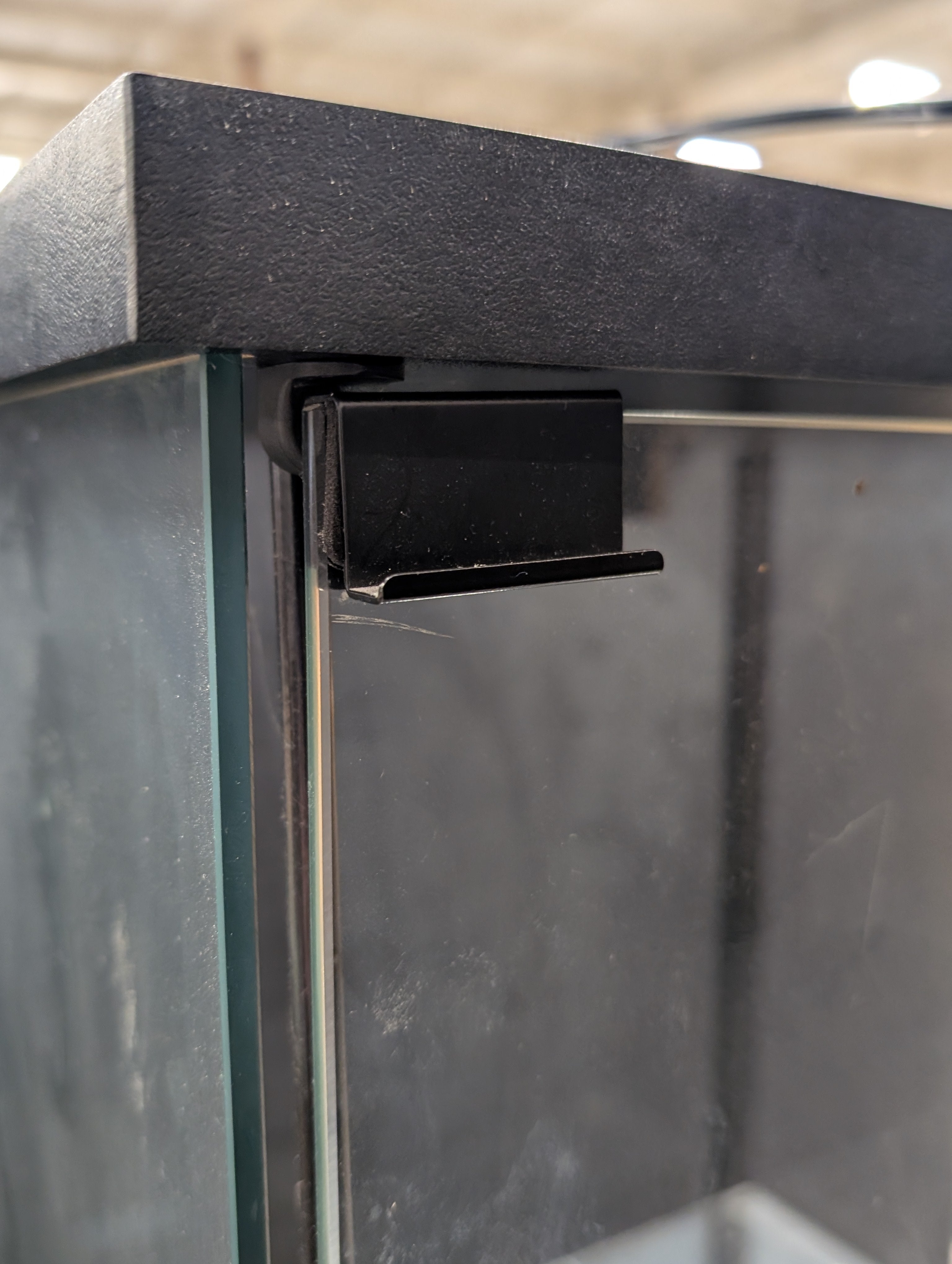 Sleek Glass Display Cabinet with Black Frame