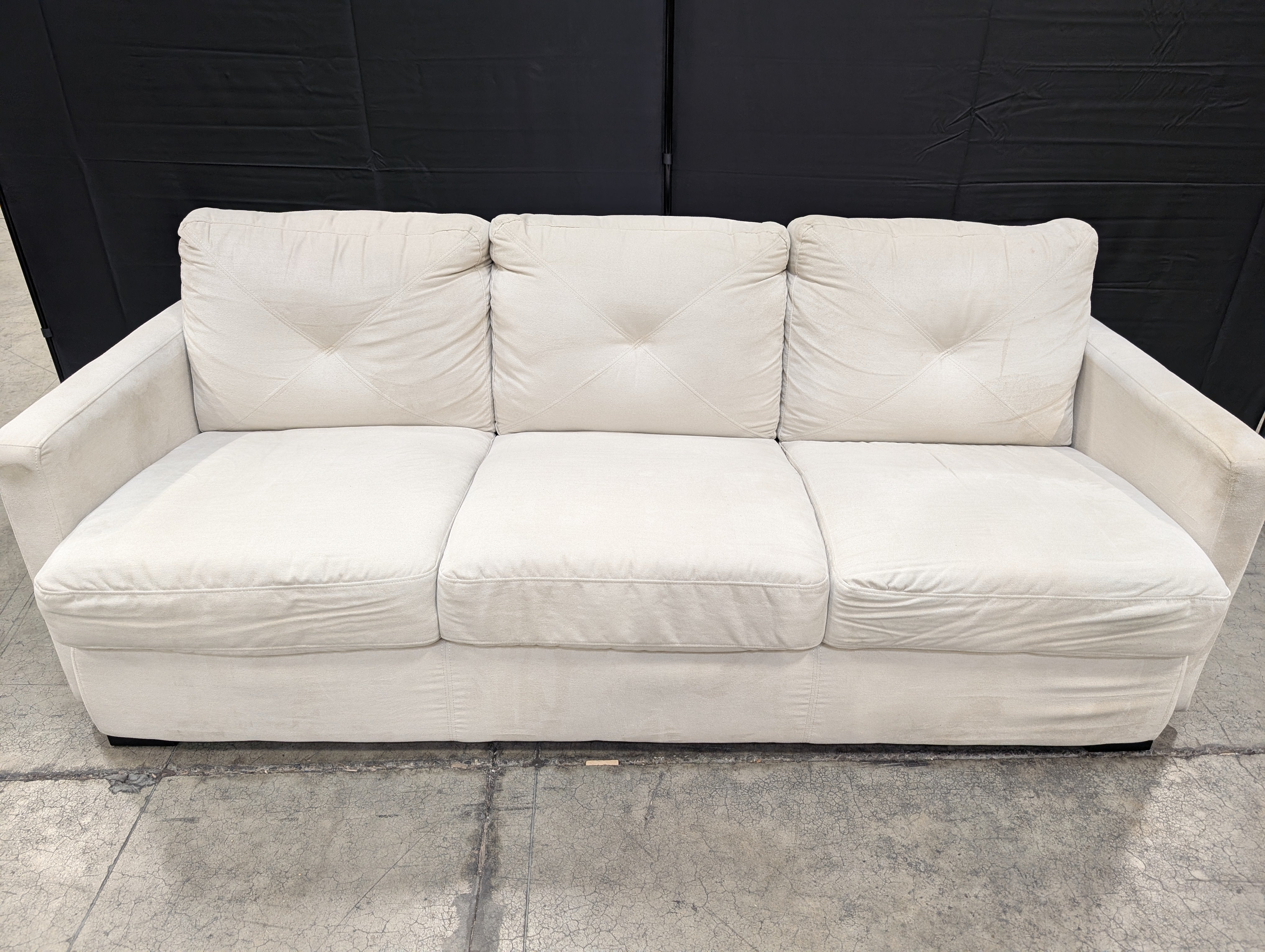 Spacious Light Beige Fabric Three-Seater Sofa