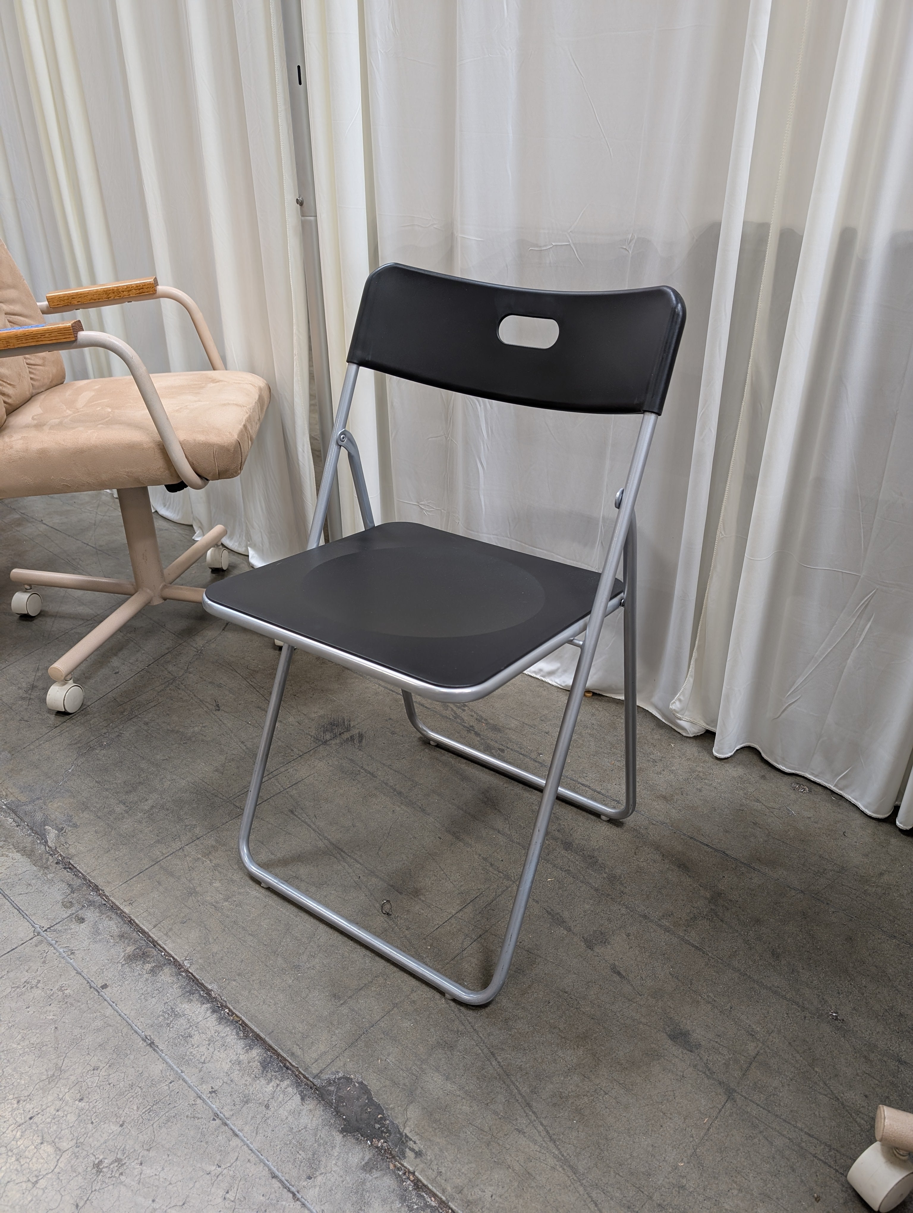 Black Metal Folding Chairs with Integrated Handles