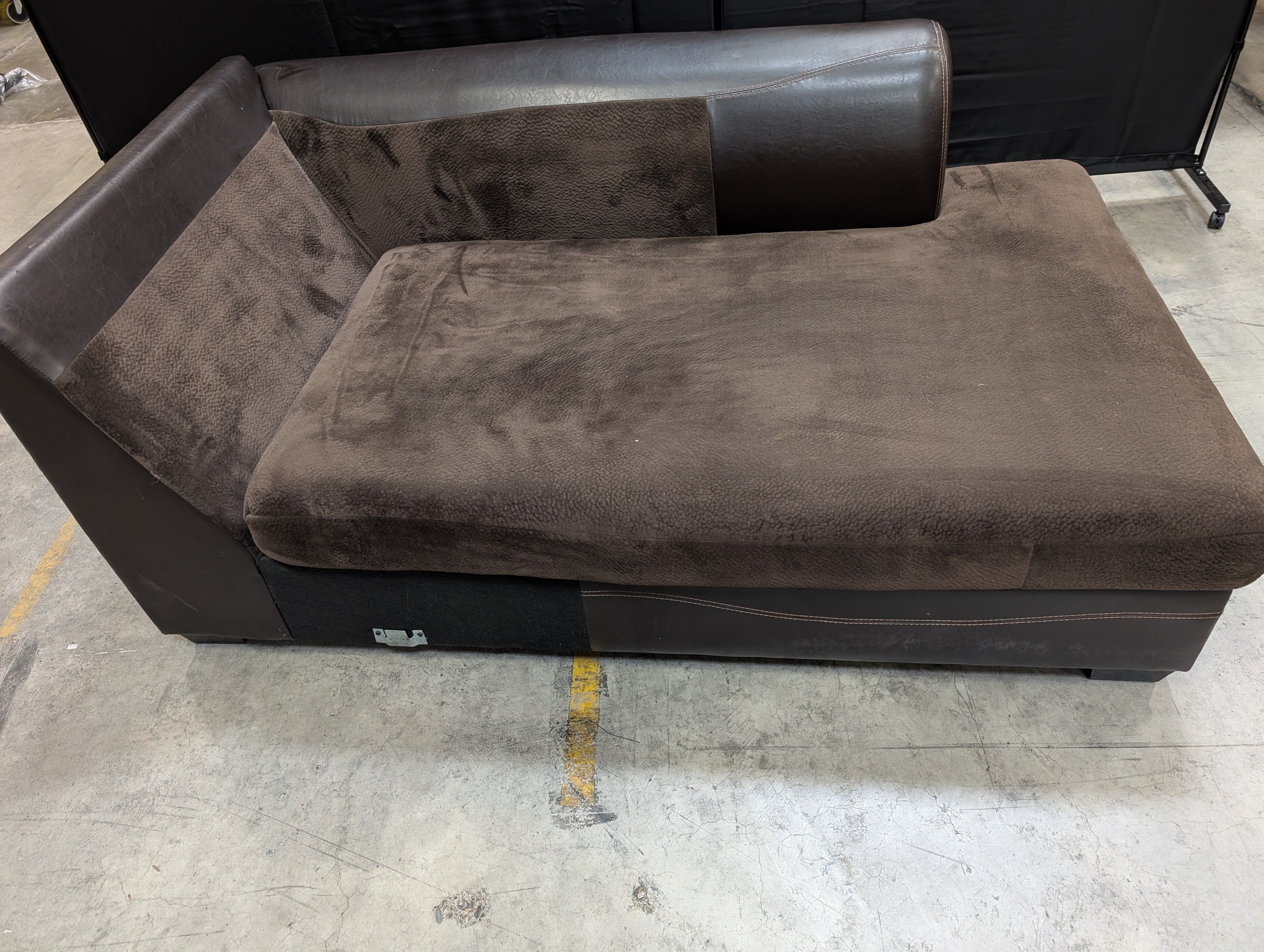 Half of Brown Chaise Lounge with four  Plush Cushions