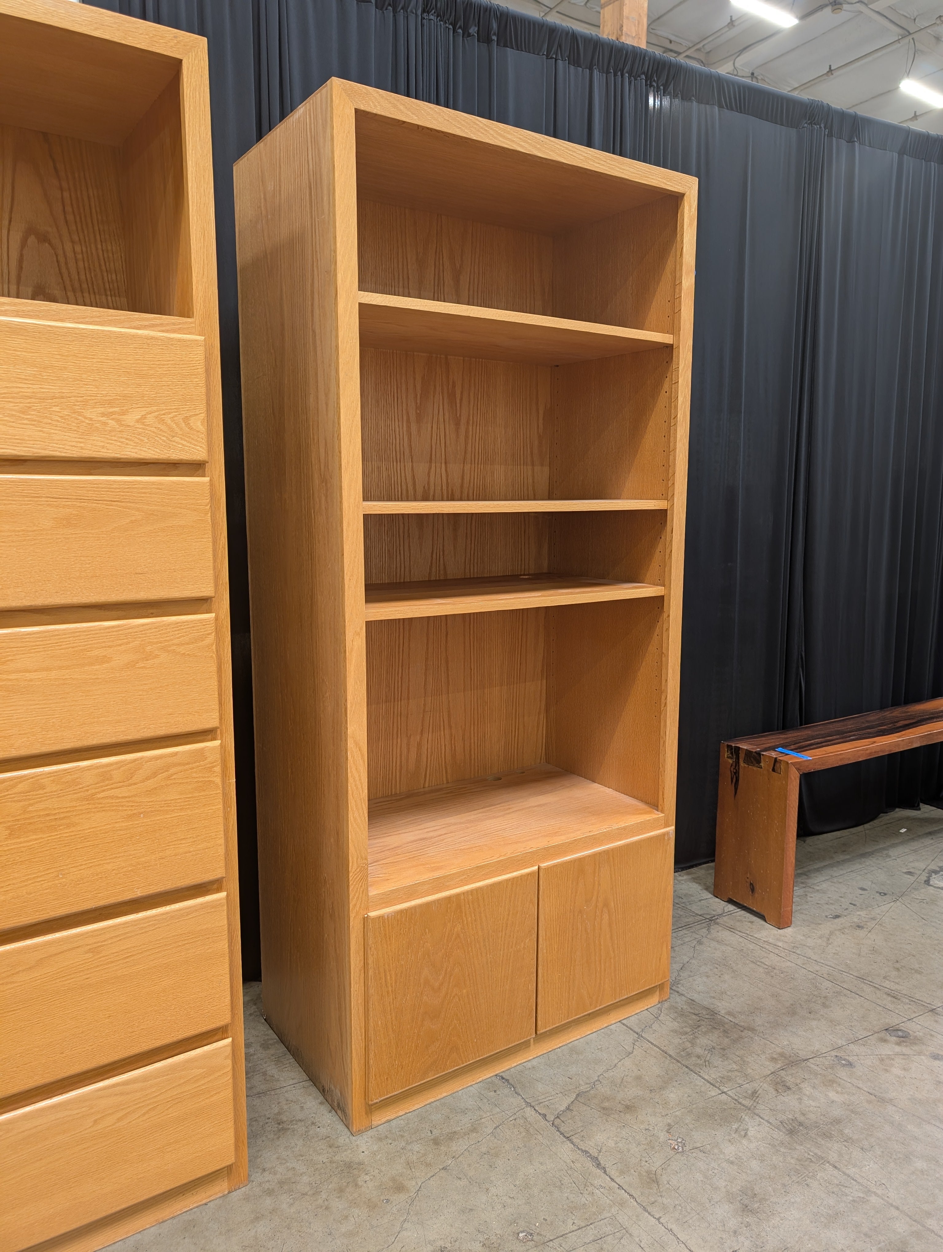 Light Brown Wood Bookcase with Three Shelves and Lower Cabinets
