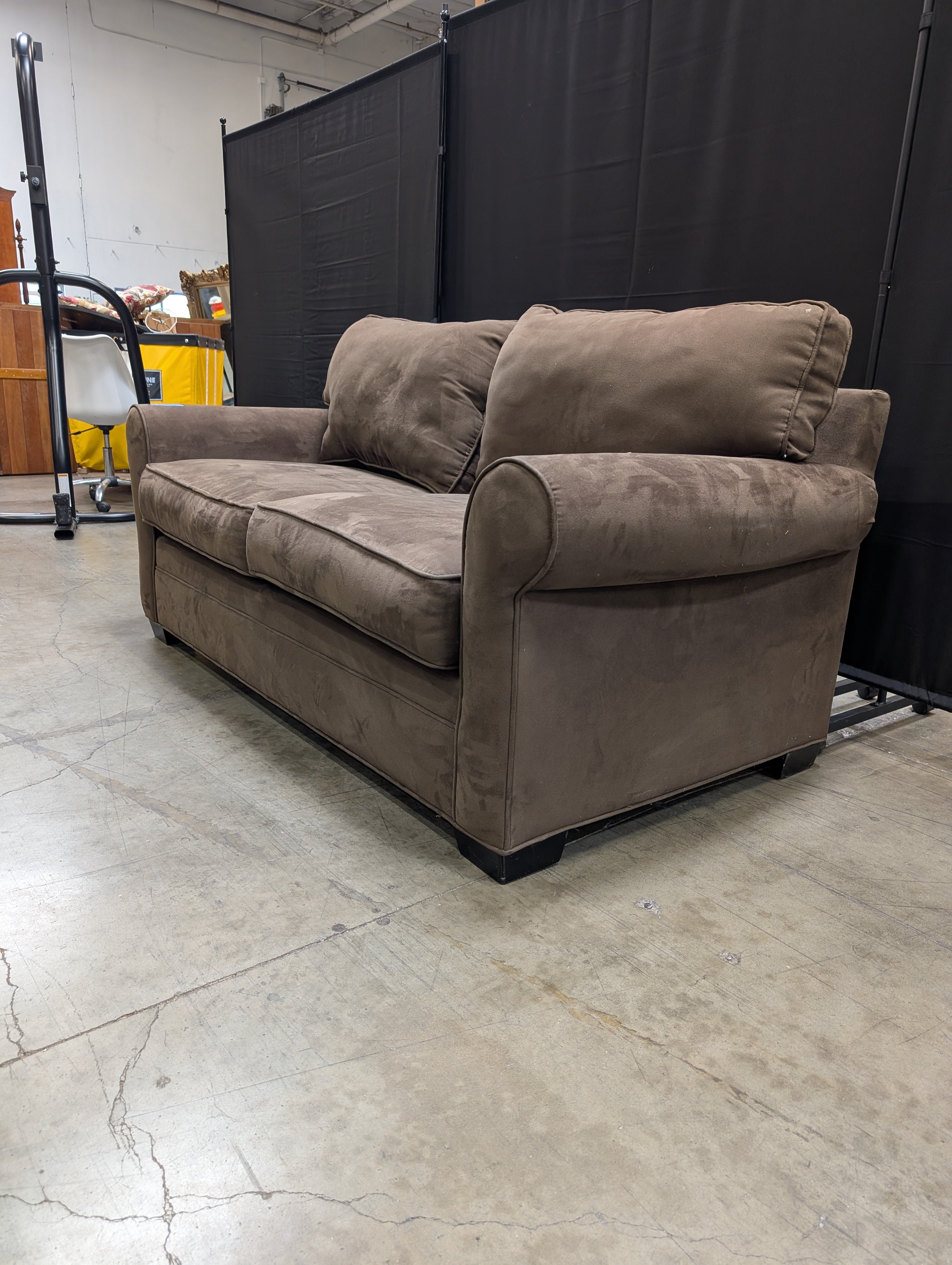 Plush Brown Two-Seater Sofa with Rolled Arms