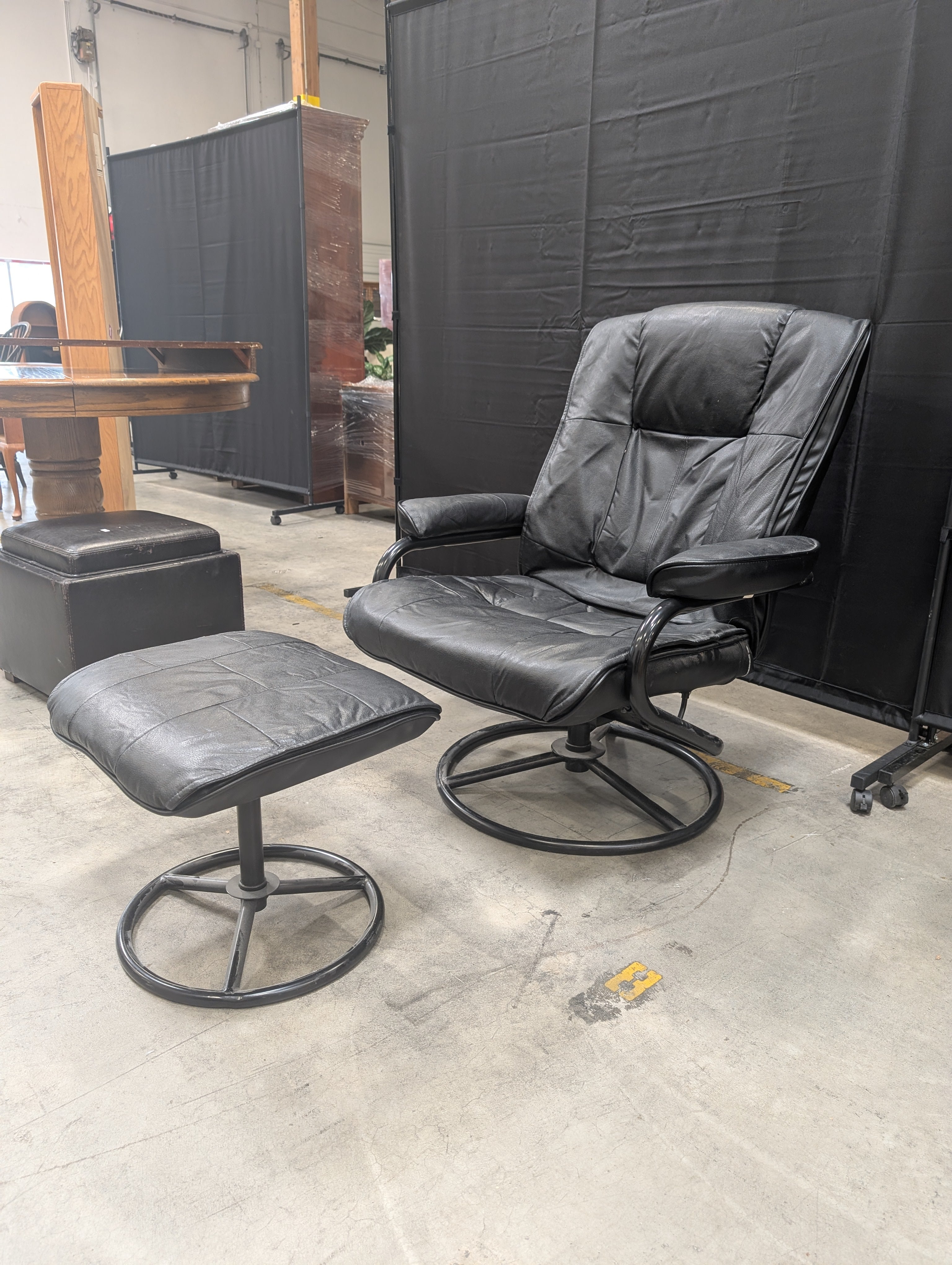 Padded Black Recliner with Ottoman