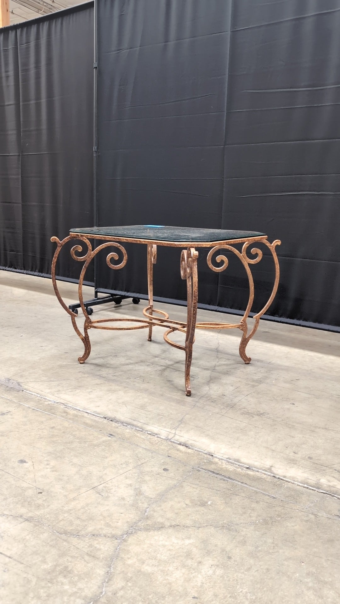 Octagonal Glass Top Accent Table with Scrollwork Metal Base