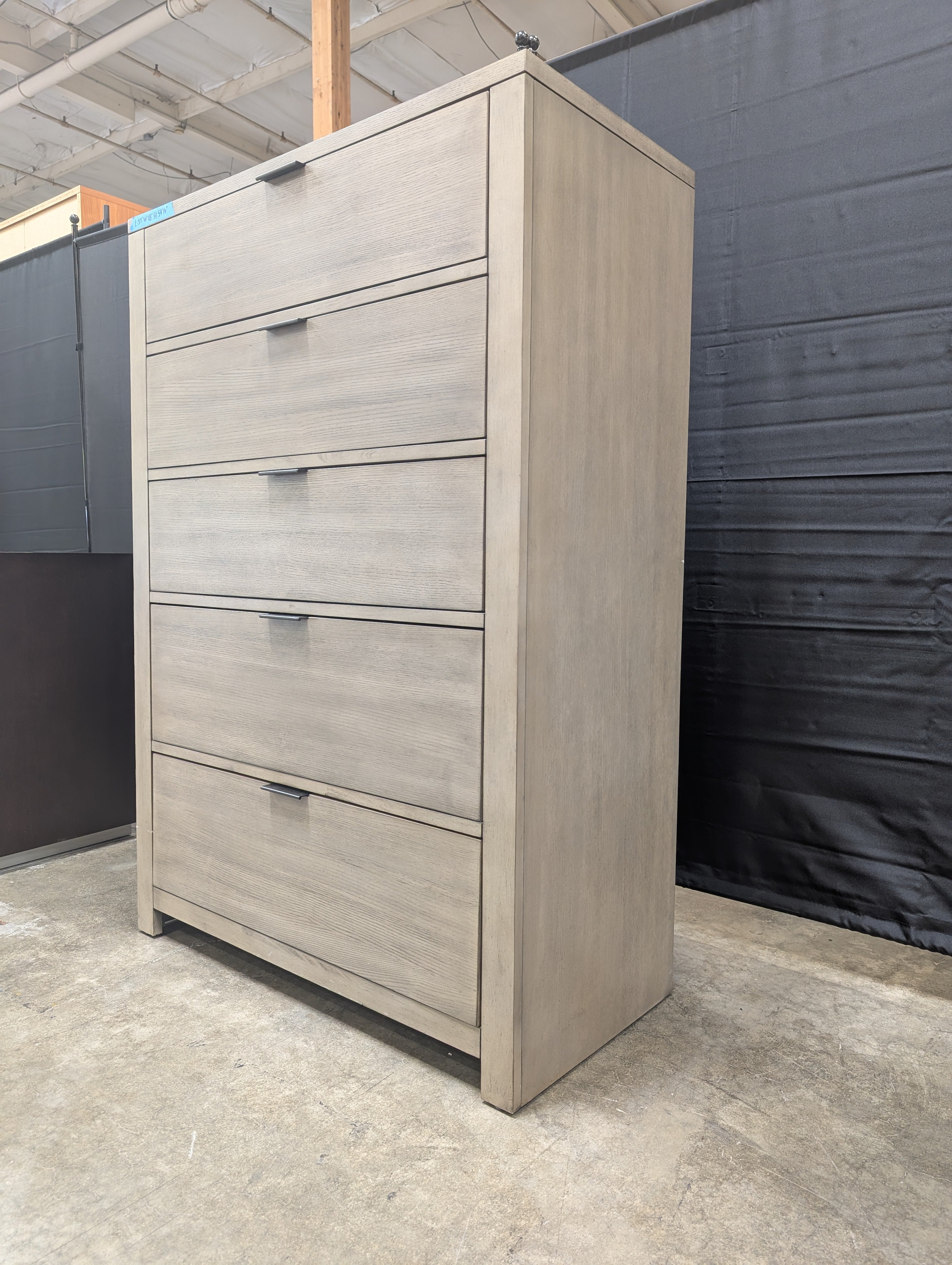 Grey Wood Five-Drawer Dresser with Metal Pulls