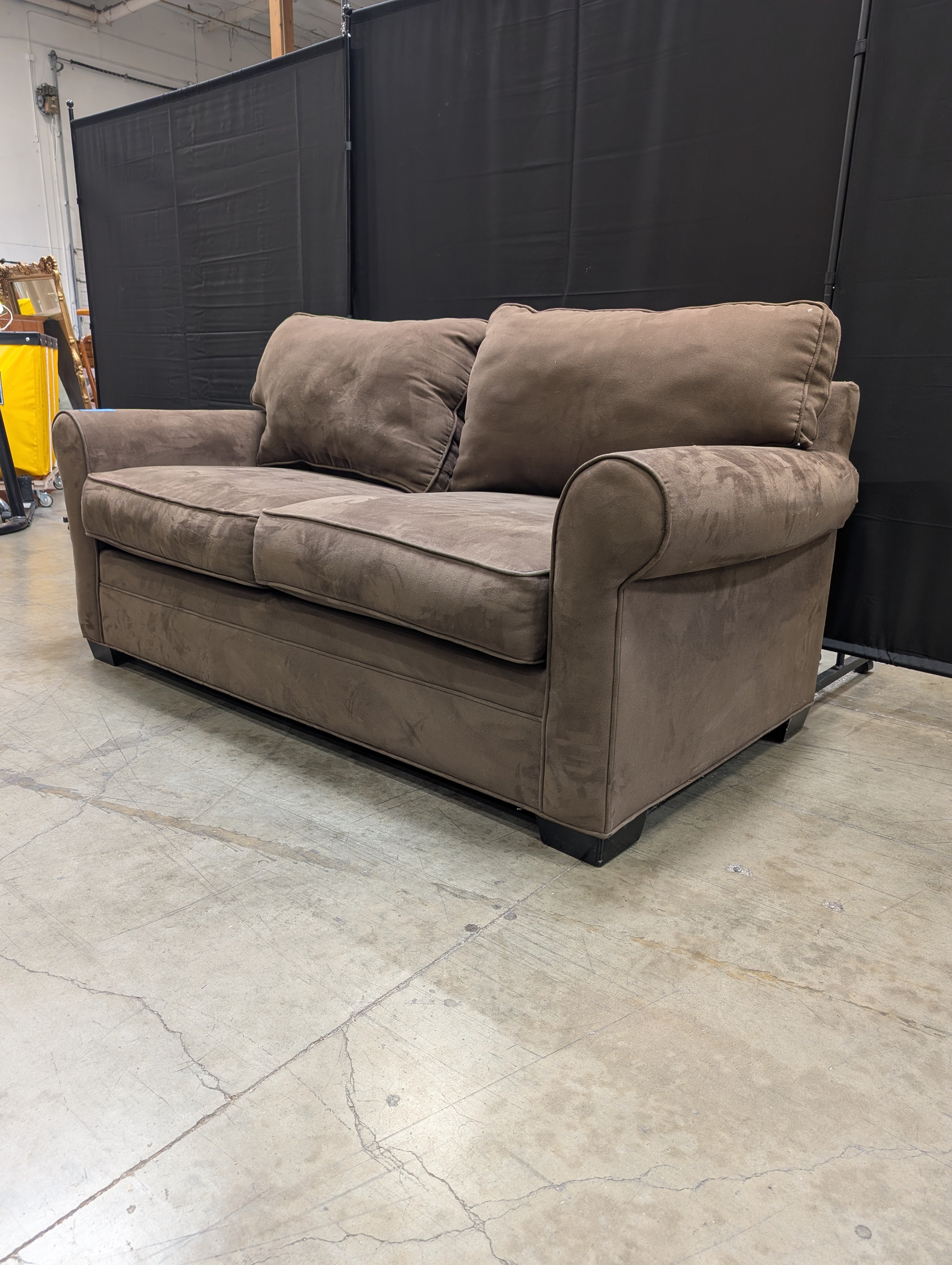 Plush Brown Two-Seater Sofa with Rolled Arms