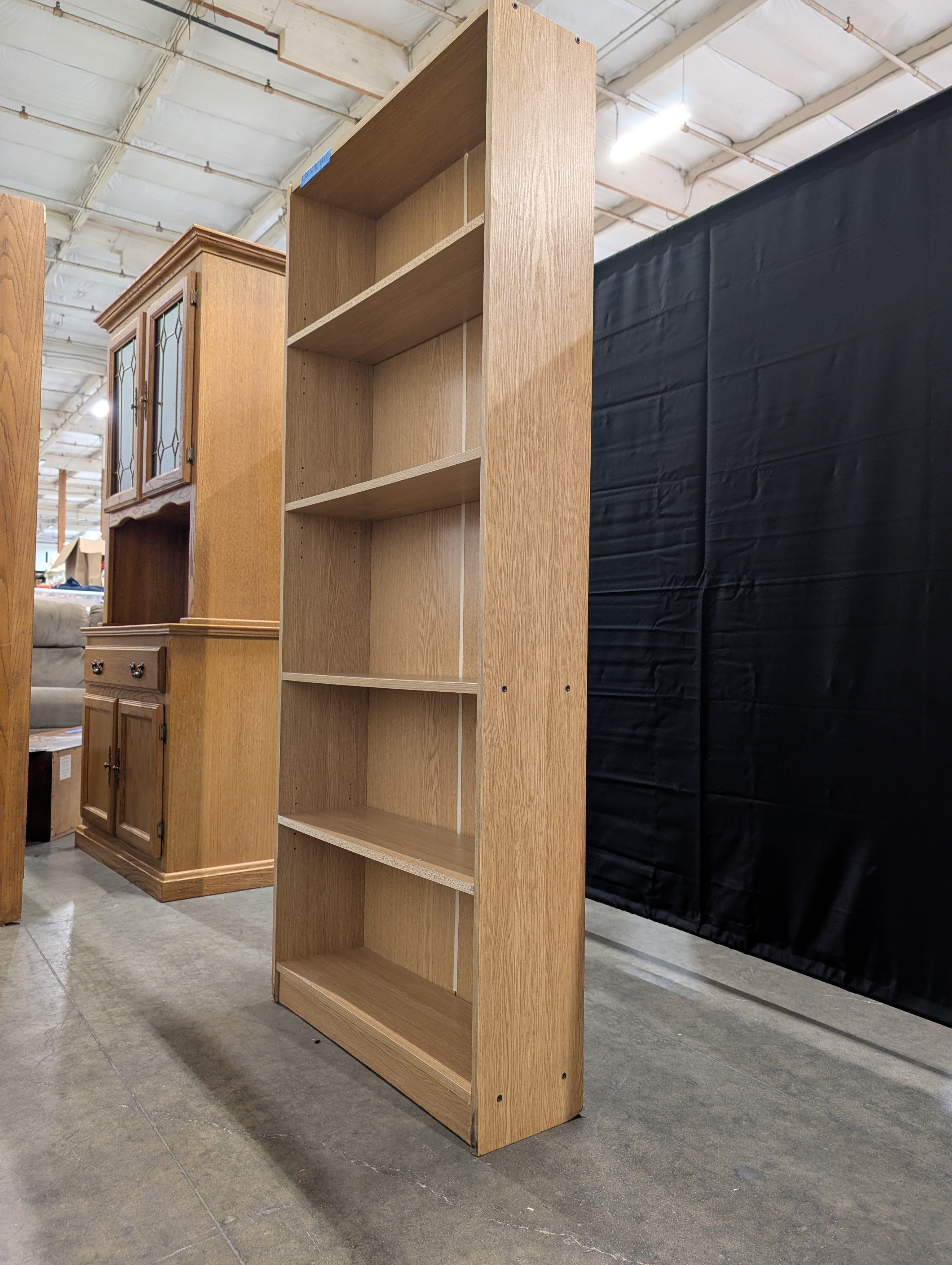 Versatile Light Wood Tone Bookcase with Adjustable Shelves
