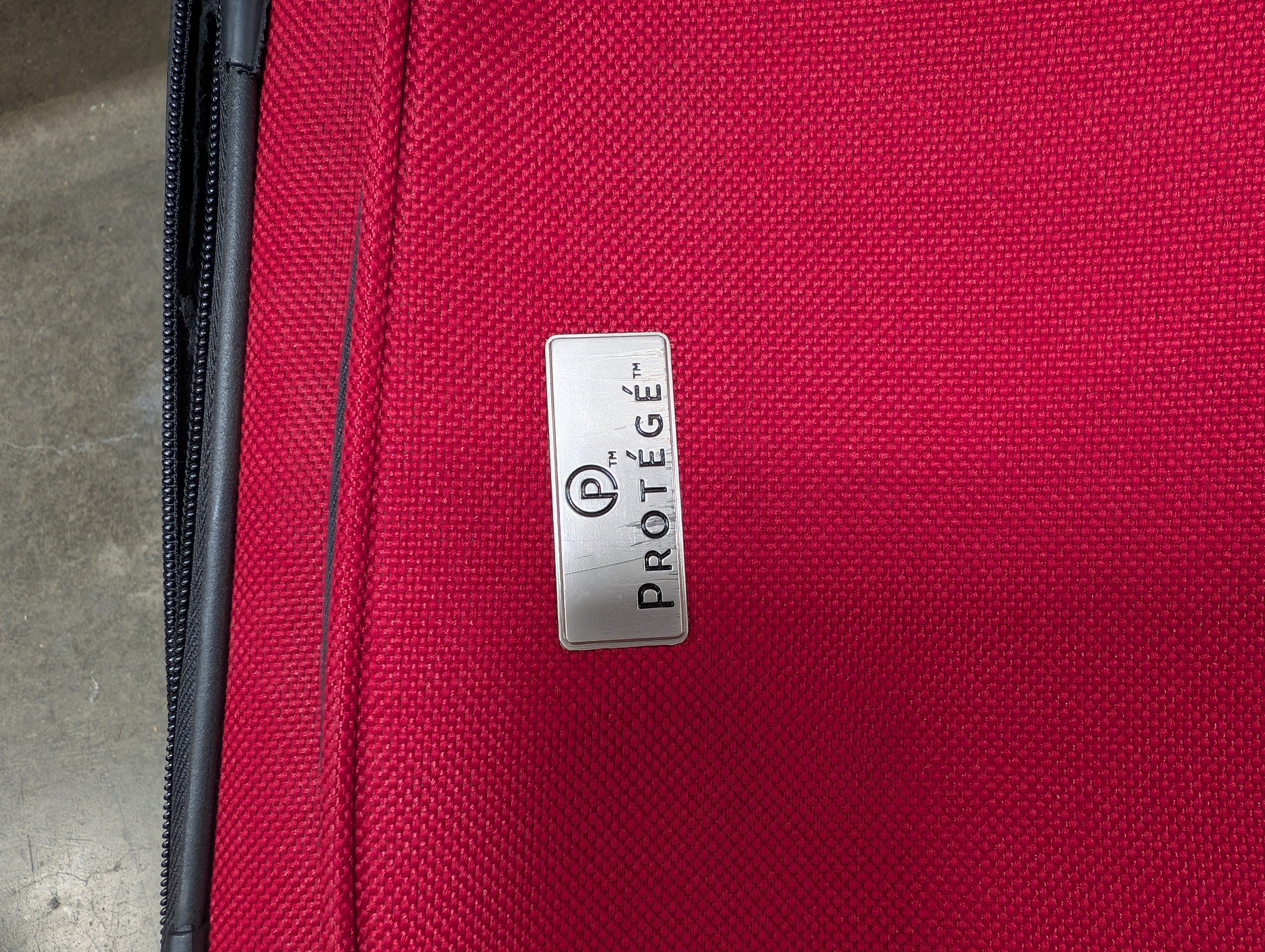 Red Softshell Rolling Suitcase with Exterior Pockets