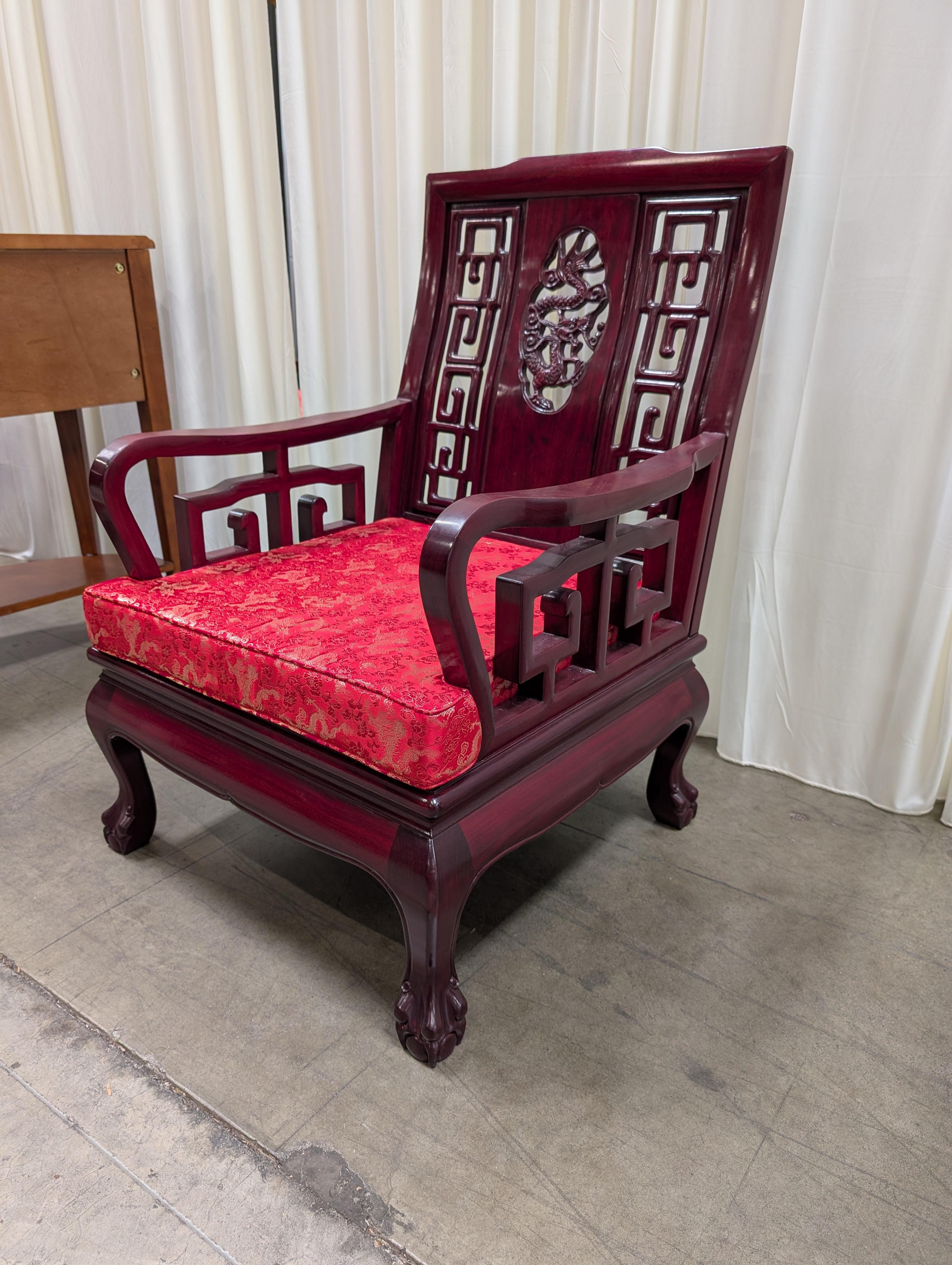 Dark Wood Carved Arm Chair with Red Cushion