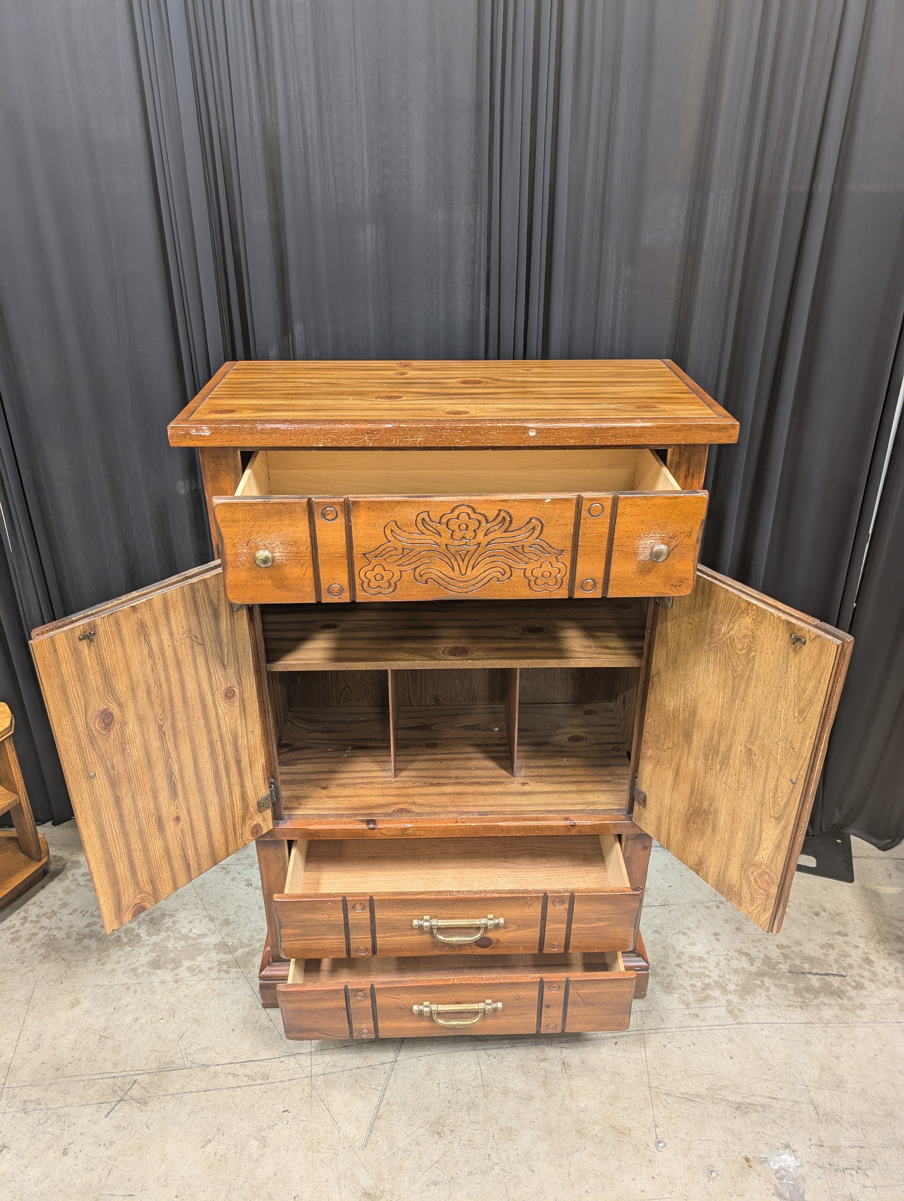 Rustic Brown Wood Armoire with Carved Details