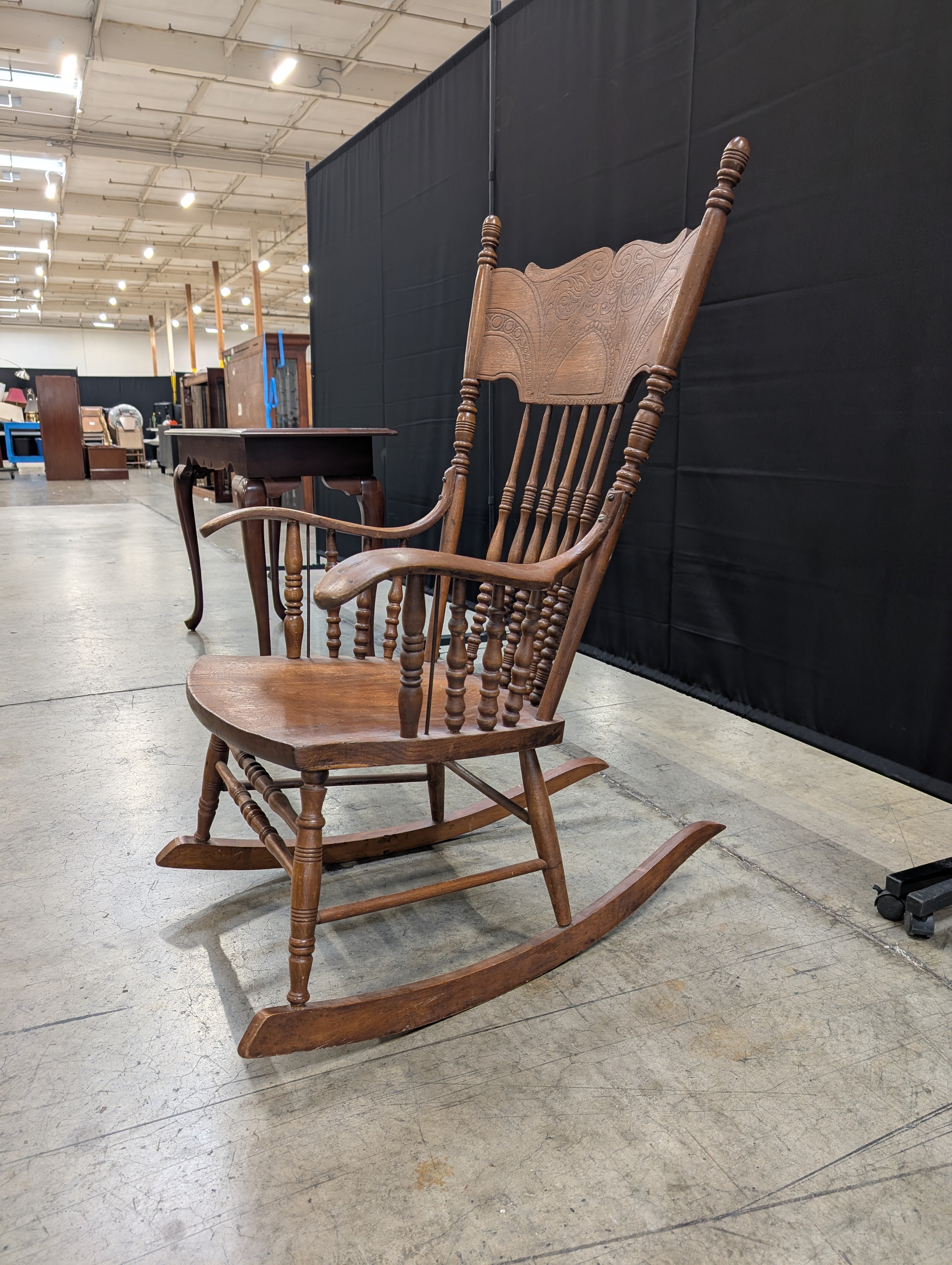 Classic Hardwood Rocking Chair with Ornate Carved Backrest