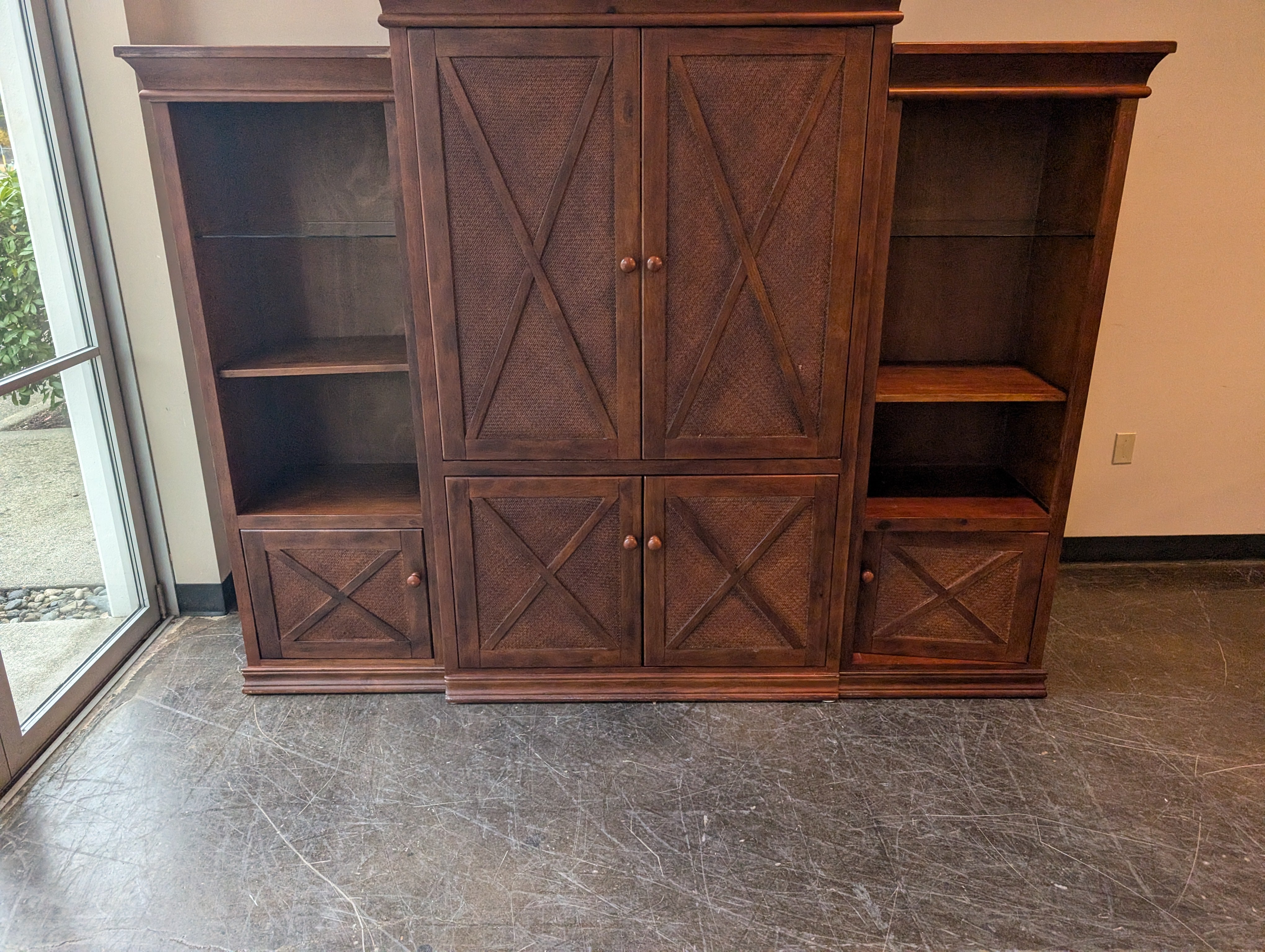 Spacious Brown Wood Entertainment Center with Woven Cabinet Doors