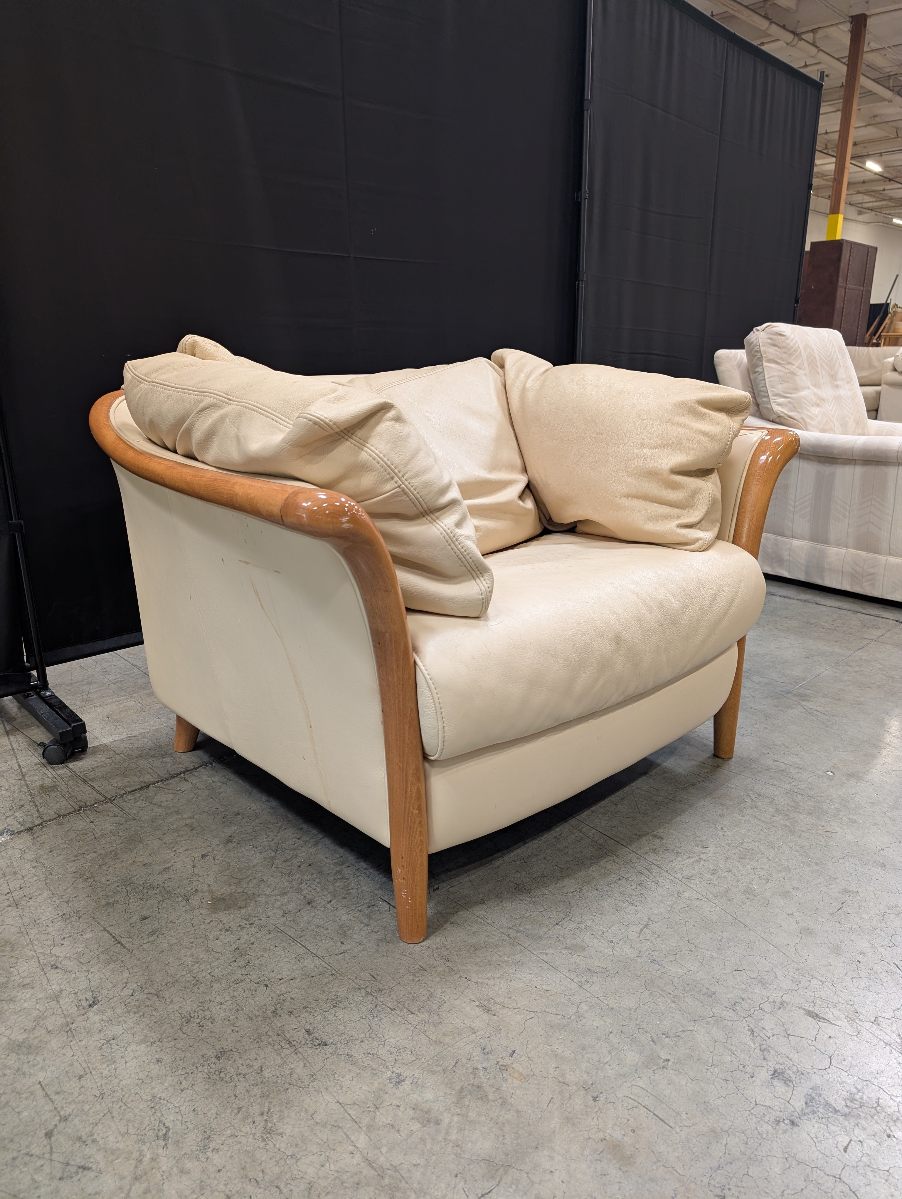 Beige leather Chair with Exposed Wood Frame