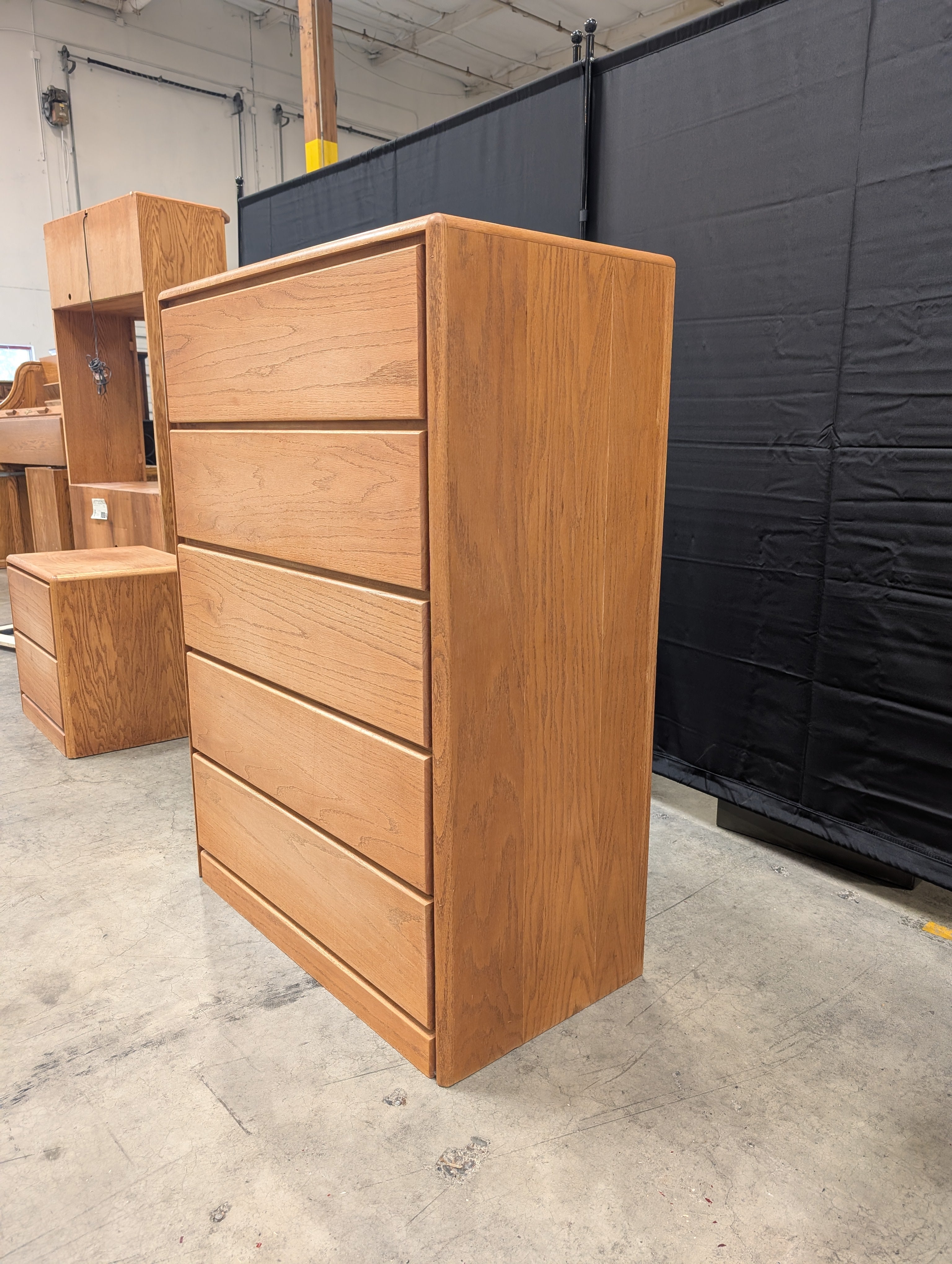 Light Wood Five-Drawer Dresser with Rounded Edges