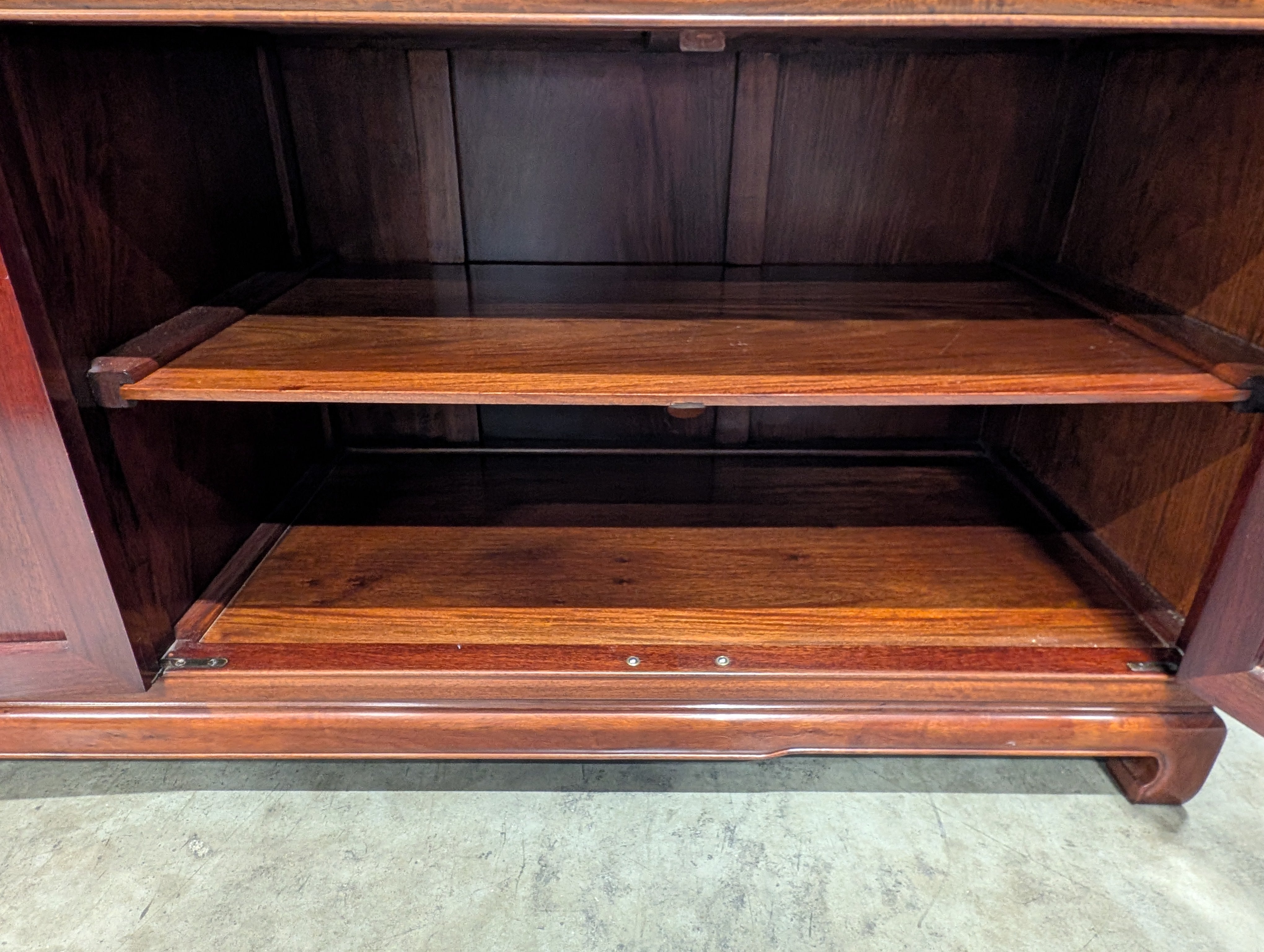 Rich Toned Wooden Sideboard with Carved Accents