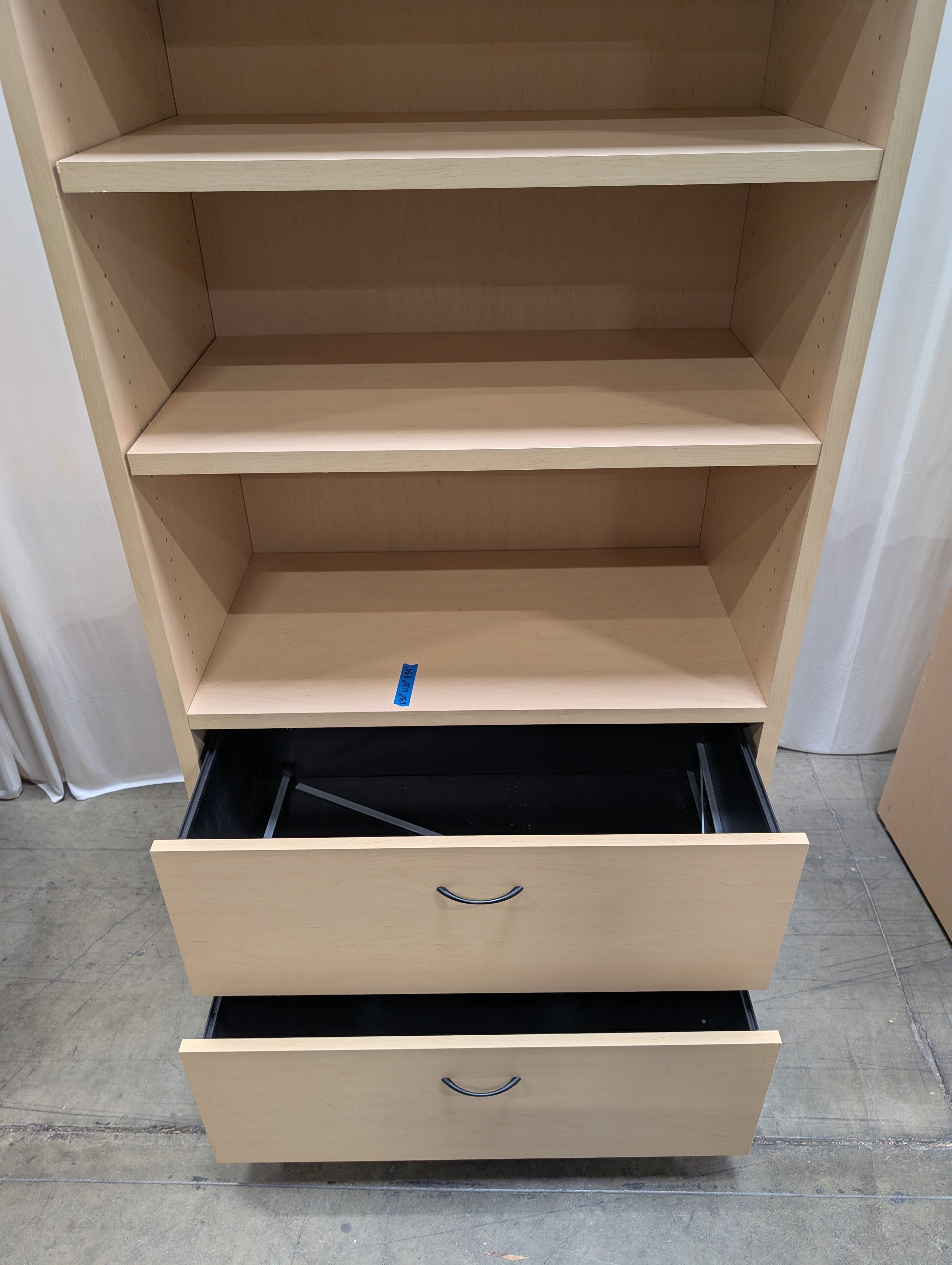 Light Wood Three-Shelf Bookcase with Two Drawers