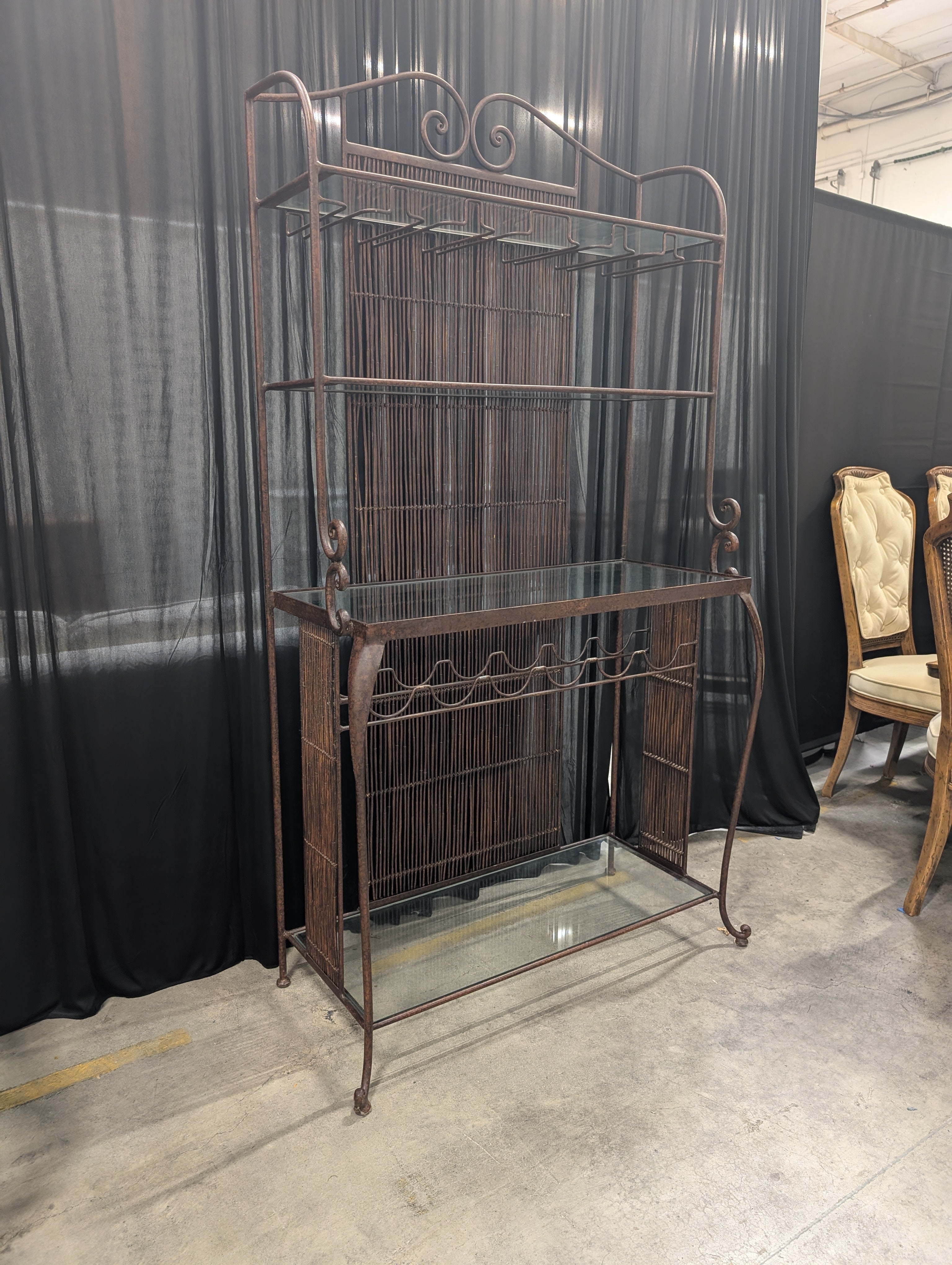 Ornate Dark Metal Baker's Rack with Woven Back
